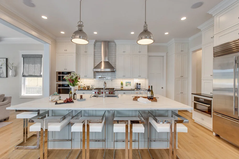 Under counter task lights, ambient lighting overhead, and pendant accents — from our Modern Glam Farmhouse Remodel