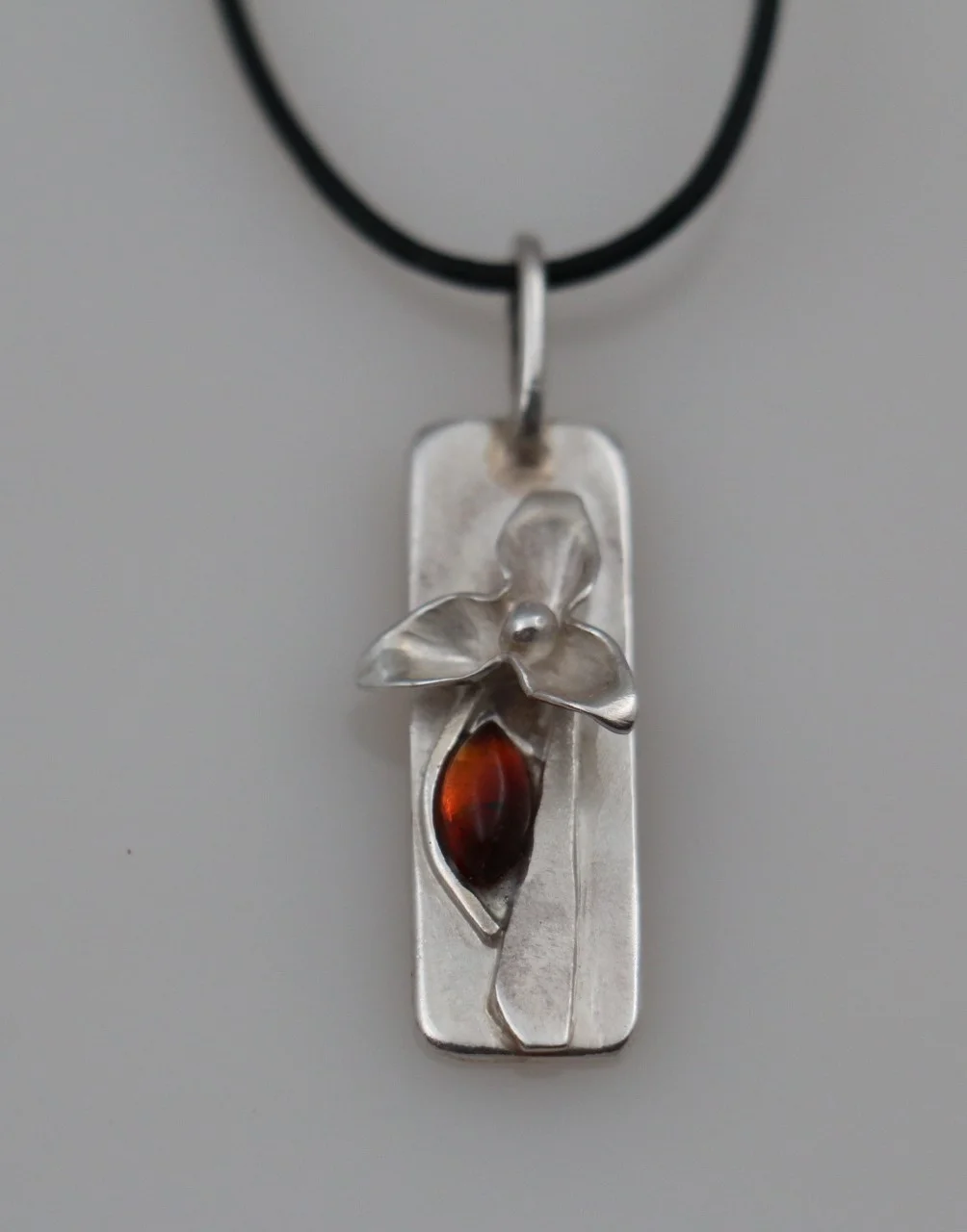 Sterling Silver Flower Plate Necklace with Polish Amber