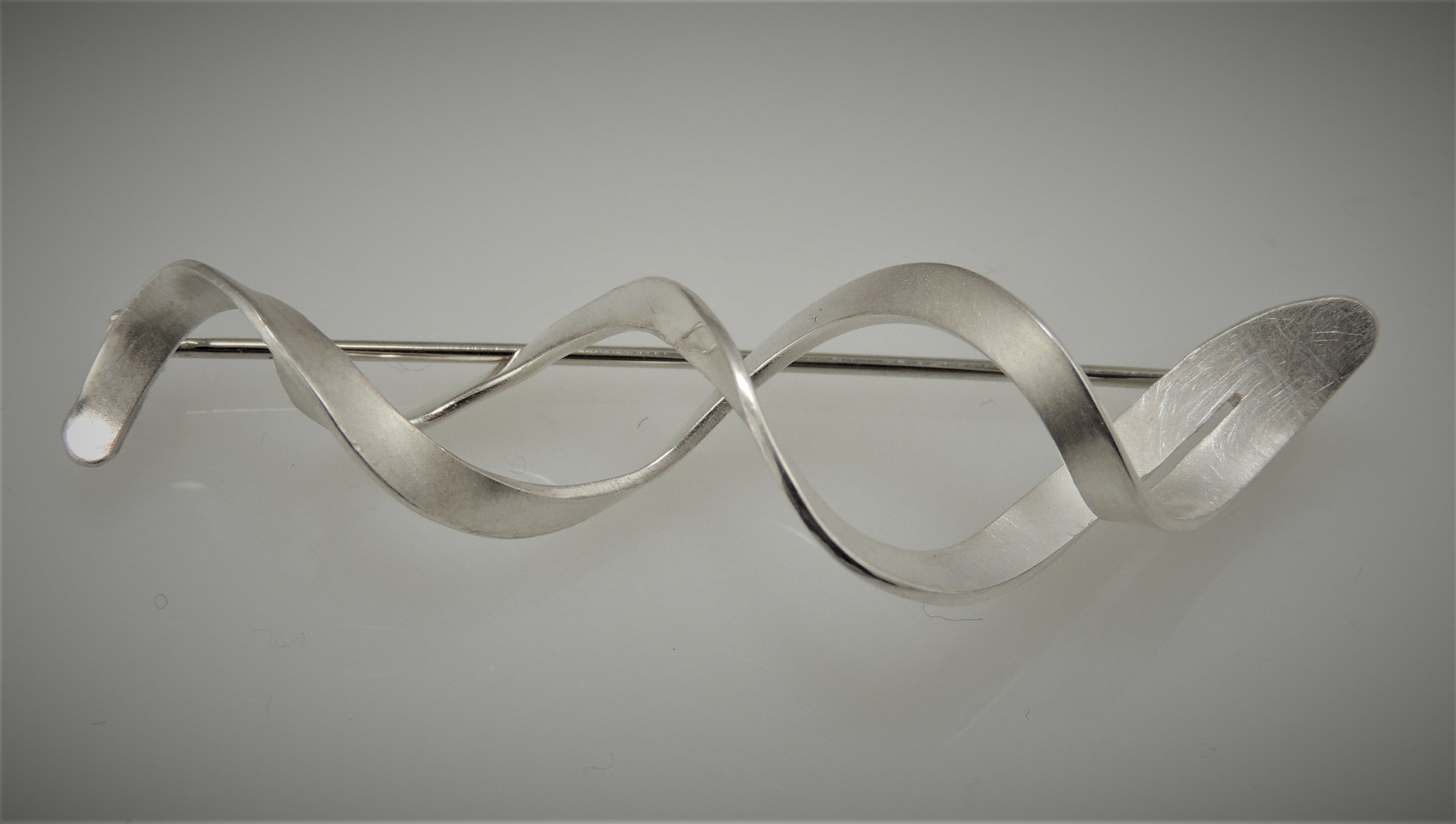 Sterling silver spiral brooch