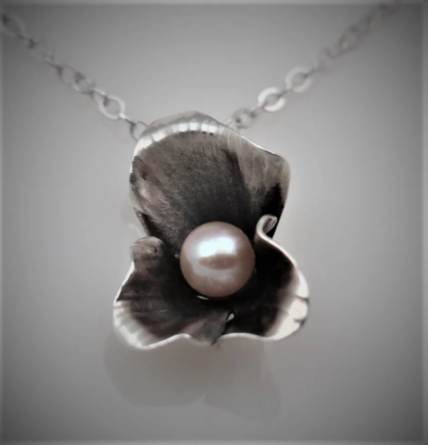 Oxidized sterling silver with a freshwater pearl 