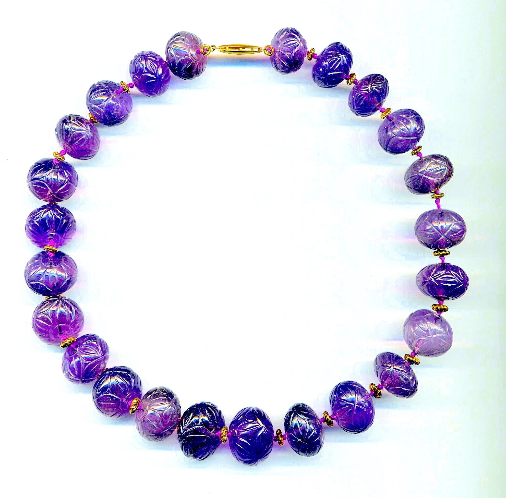 Carved Amethyst Necklace.jpeg