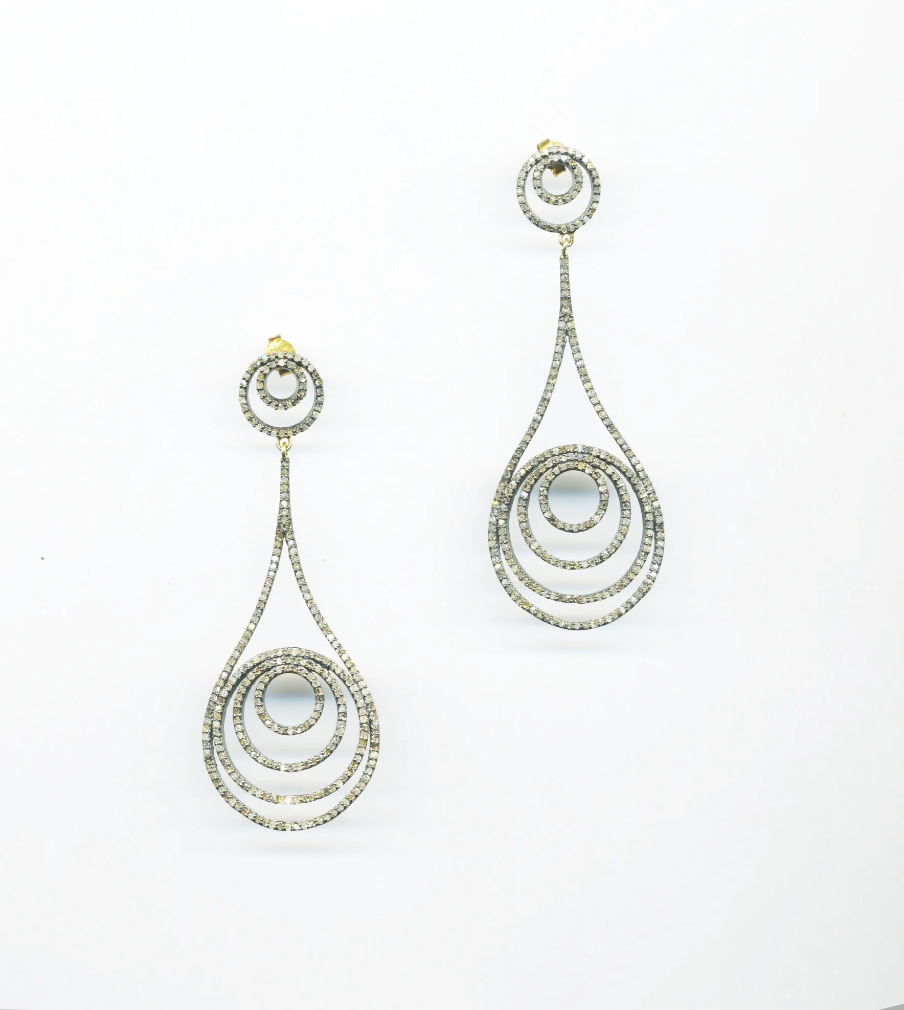 Diamond Swirl Earrings.jpeg