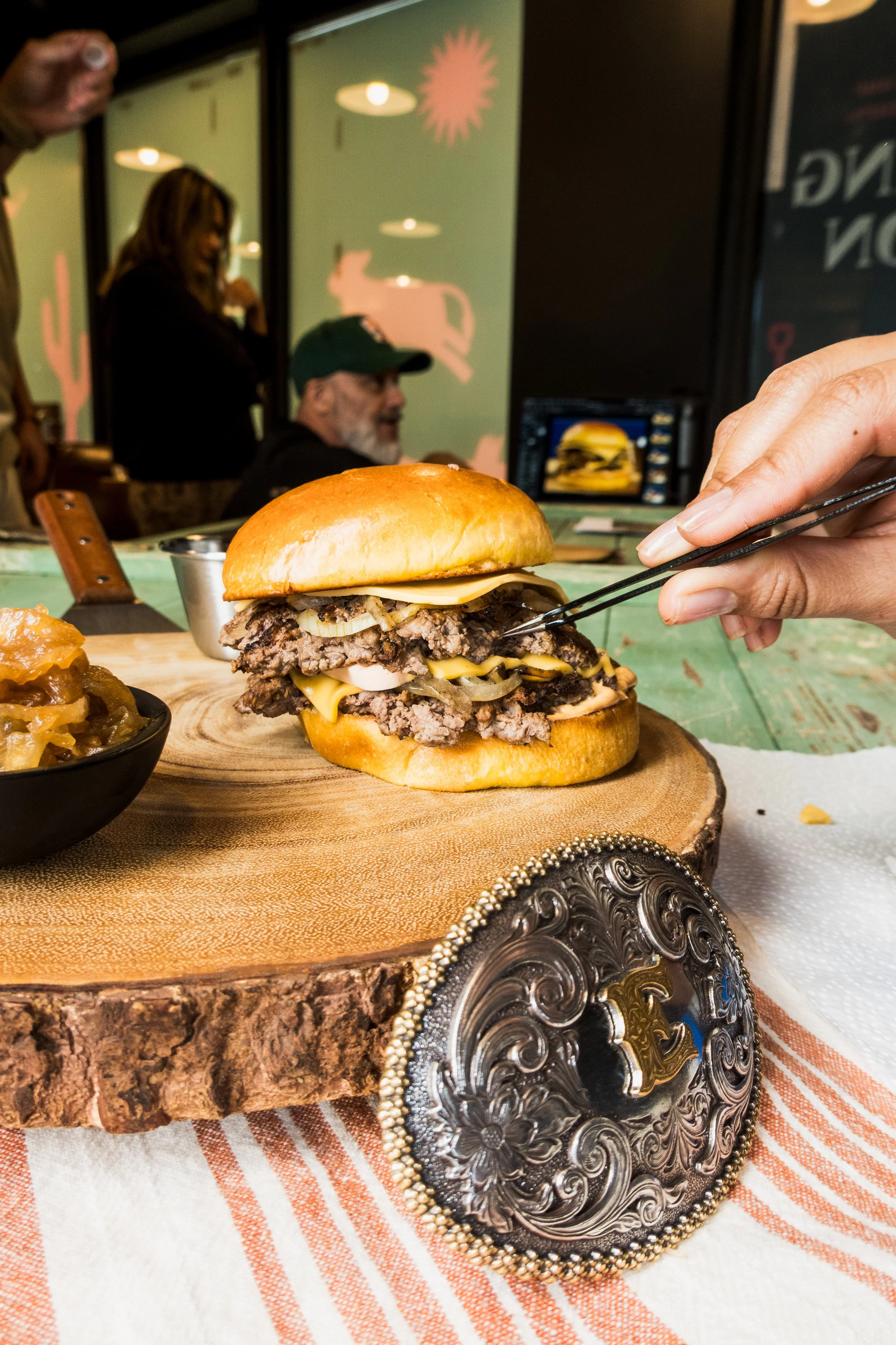Behind the Scenes food styling of a commercial burger photography campaign for fast casual restaurant brand in Miami
