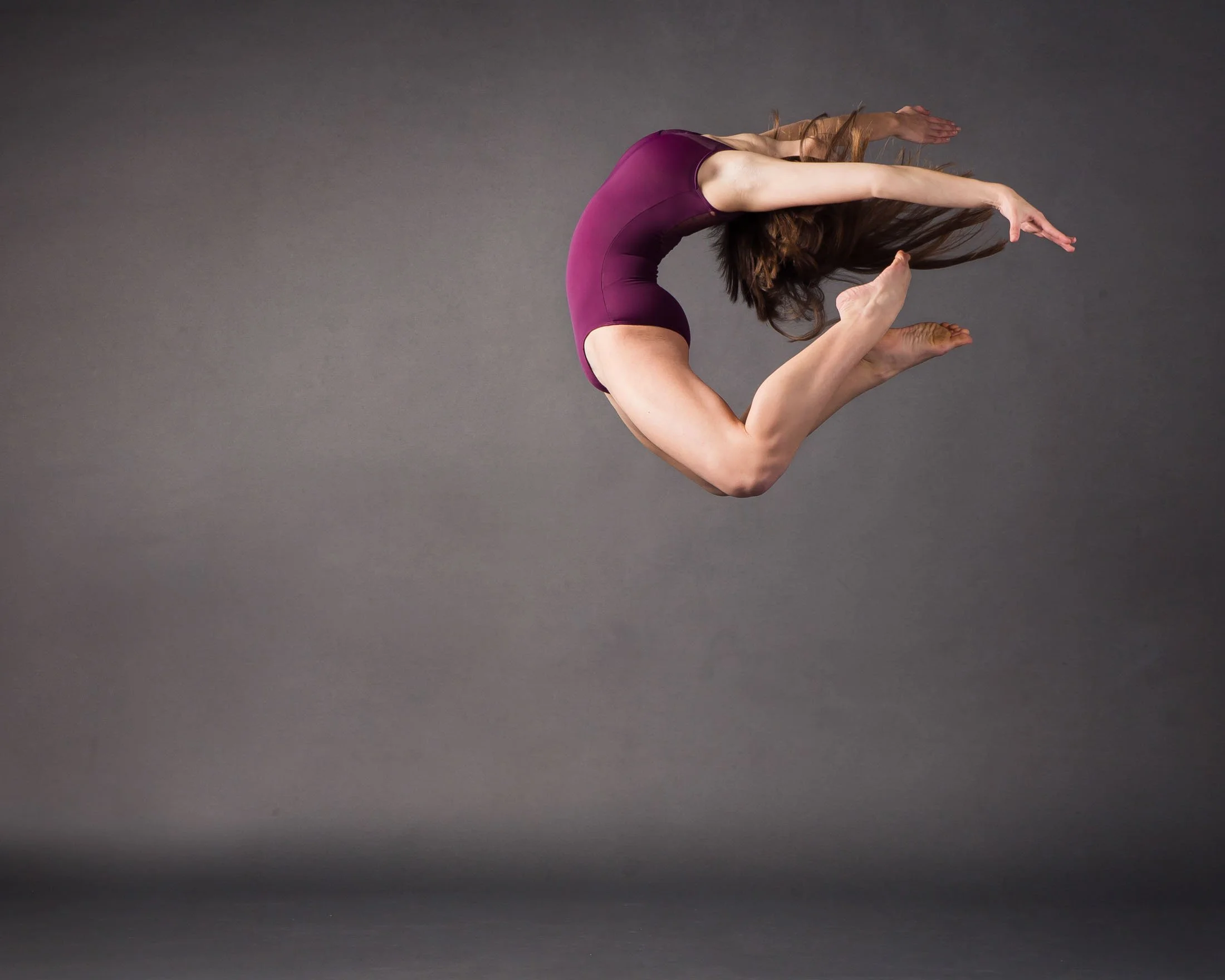 Contemporary dance jump at photoshoot