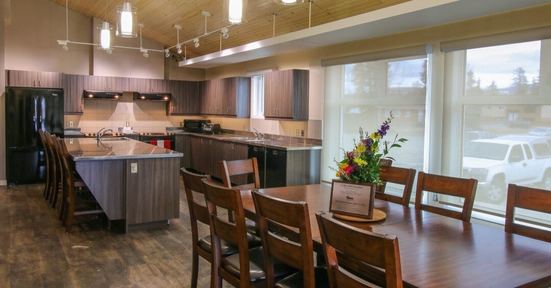 The kitchen and dining space is the heart of the St. Elias Group Home in downtown Whitehorse. The extra large kitchen accommodates additional stove tops and storage  as it serves as a learning kitchen and a communal gathering place for residents. 

#