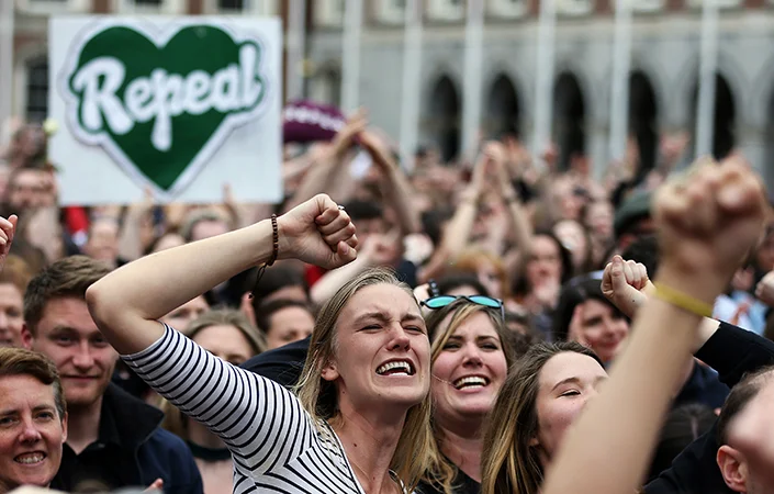 Yes supporters celebrate Ireland's landslide vote for change.
