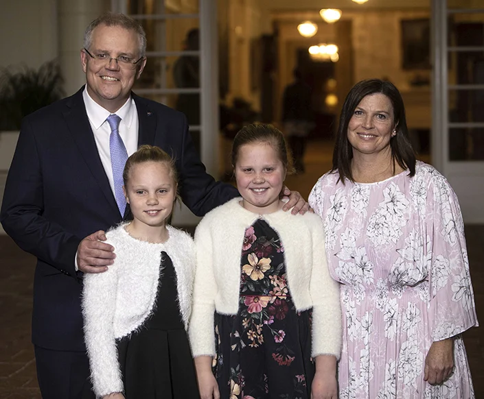 New Australian Prime Minister Scott Morrison with daughters, Abigail, second from right, and Lily, second from left, and wife Jenny after being sworn in at Government House, Canberra. Picture: Andrew Taylor