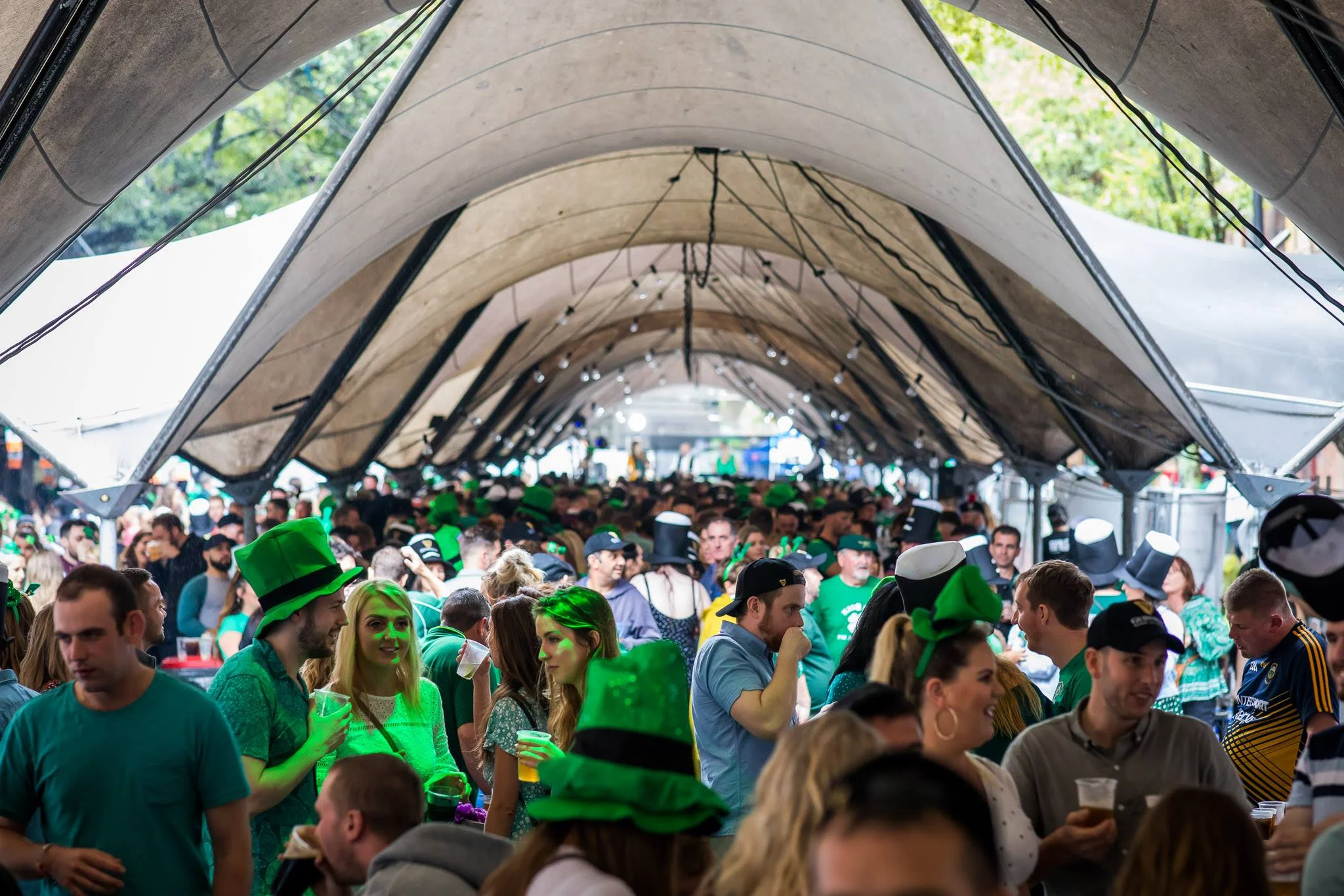 Large crowds made their way to The Rocks on St Patrick’s Day despite the downpour.