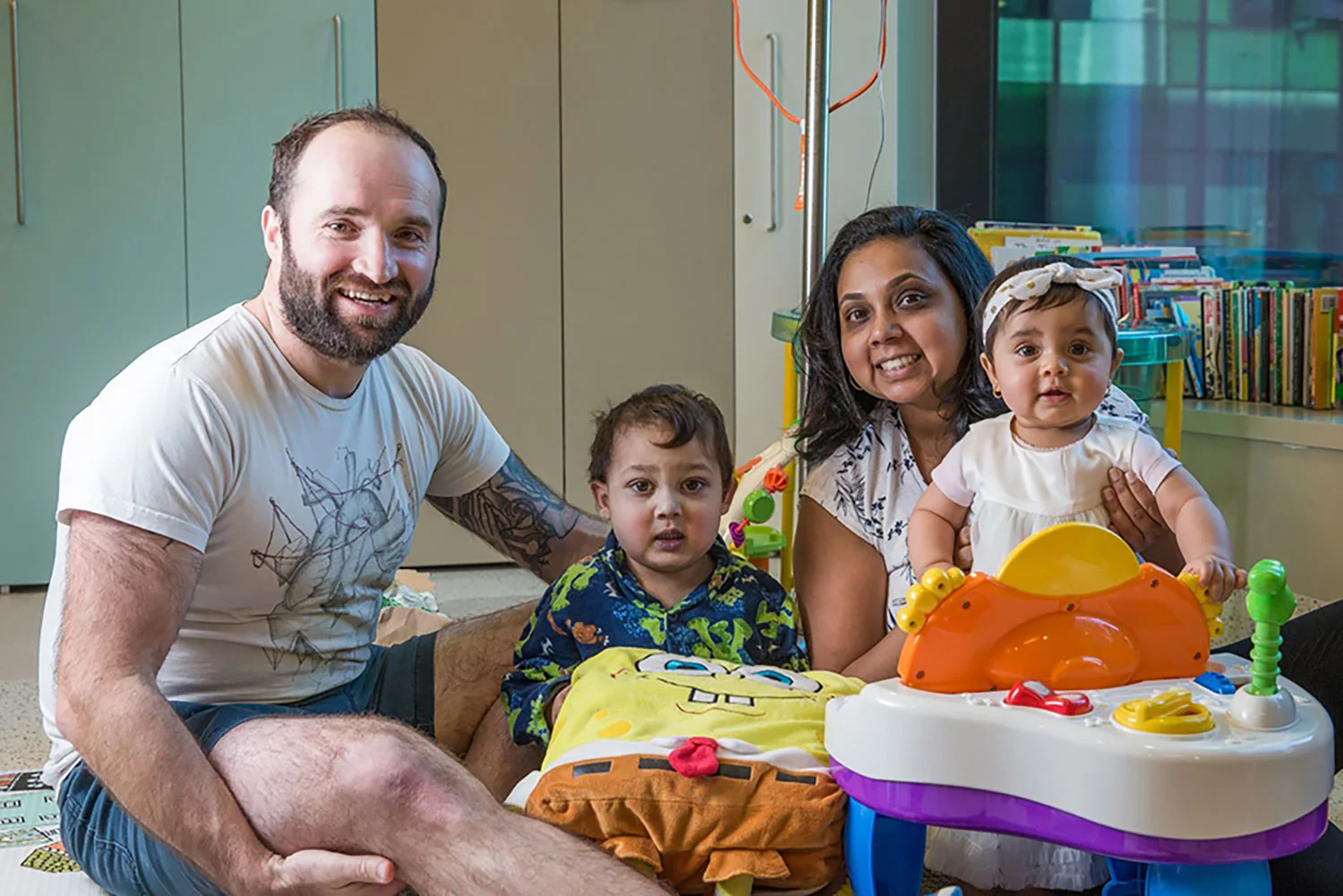 Father Liam, David, mother Cindy and Bella at Melbourne’s Royal Children’s Hospital. Photo: Adrienne Myszka, Heartfelt.