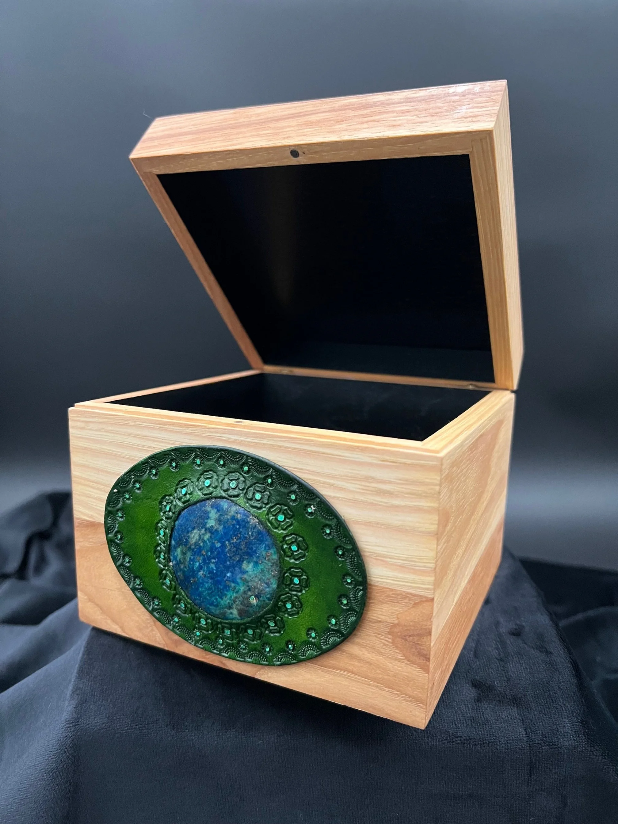 wood box green setting blue stone.jpg