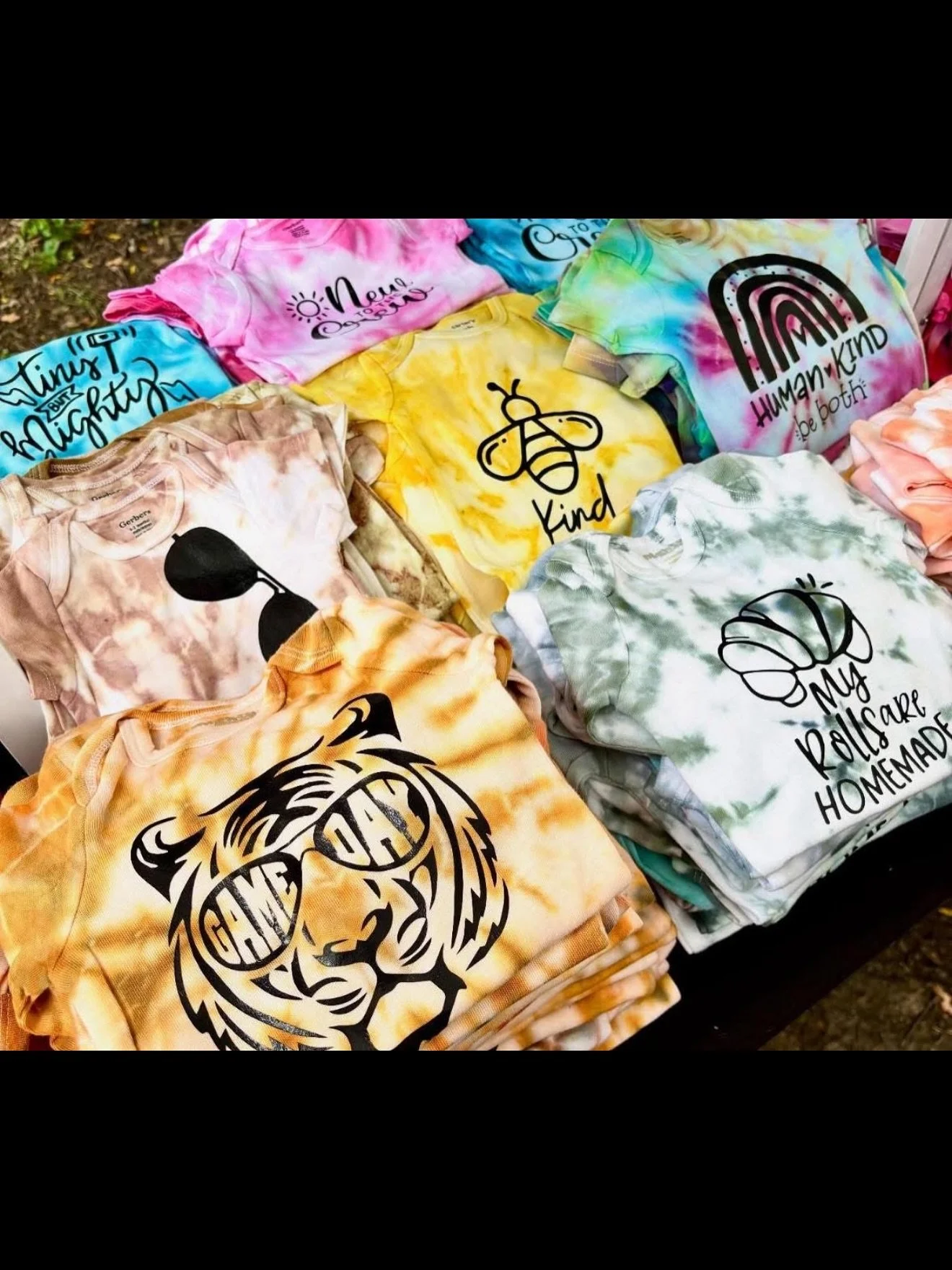 👕✨ Say hello to MC Design (On Facebook) a local educator and creative entrepreneur bringing unique shirts to the West Side Holiday Market!

West Side Market is one of their favorite events, with many repeat customers returning to shop their booth an