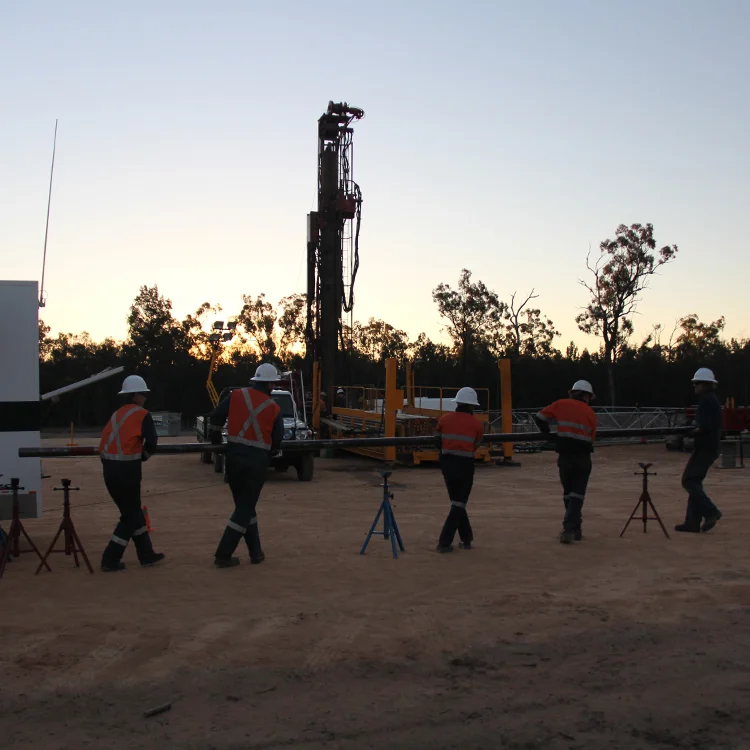 Drill Stem Testing Farley Riggs team on site at dusk Australia