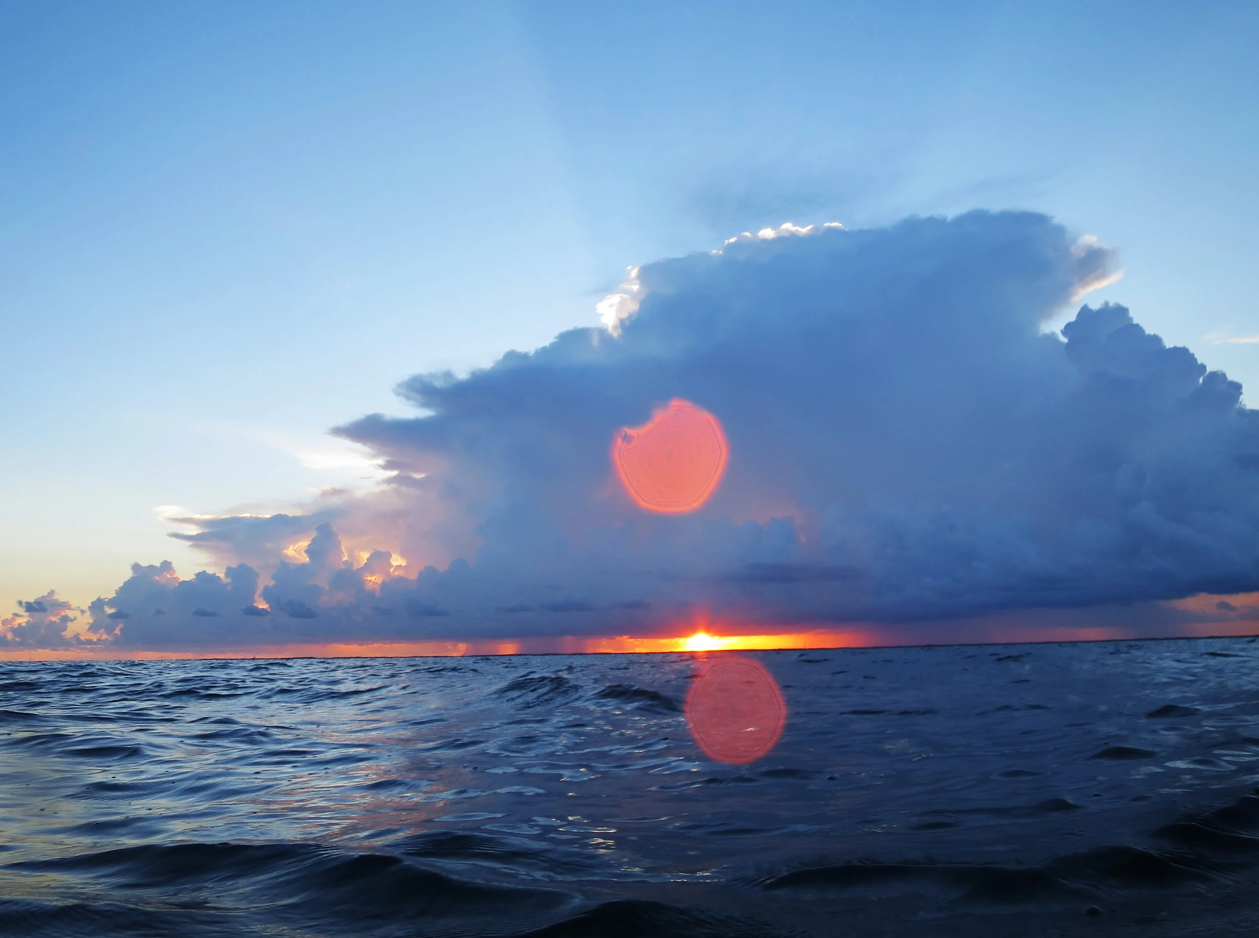 The sun sets over John Pennekamp Coral Reef State Park in Key Largo, FL as we wait for coral spawning to begin.