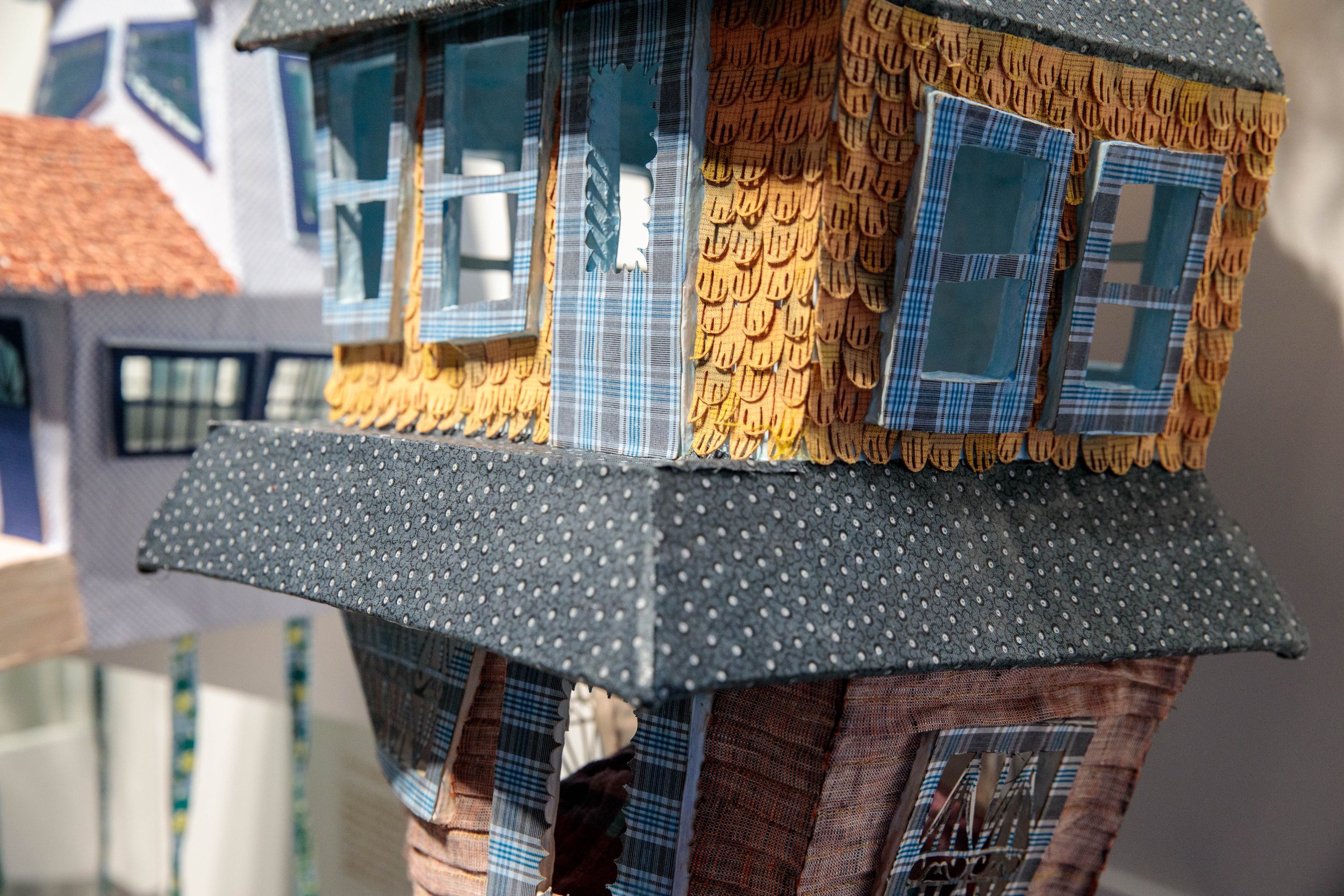 Sculpture detail for “Apartment Building, Far Rockaway”.