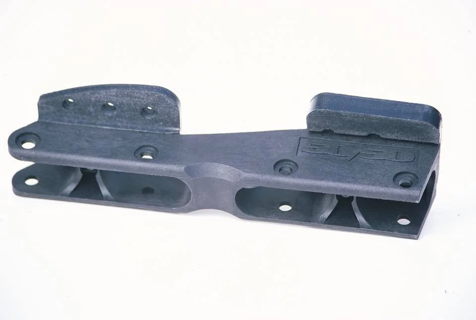 We started testing the first moulded 50/50 frames in 1998. They were poured in California, available only in “medium” size, and were solid black with UHMW baseplates.