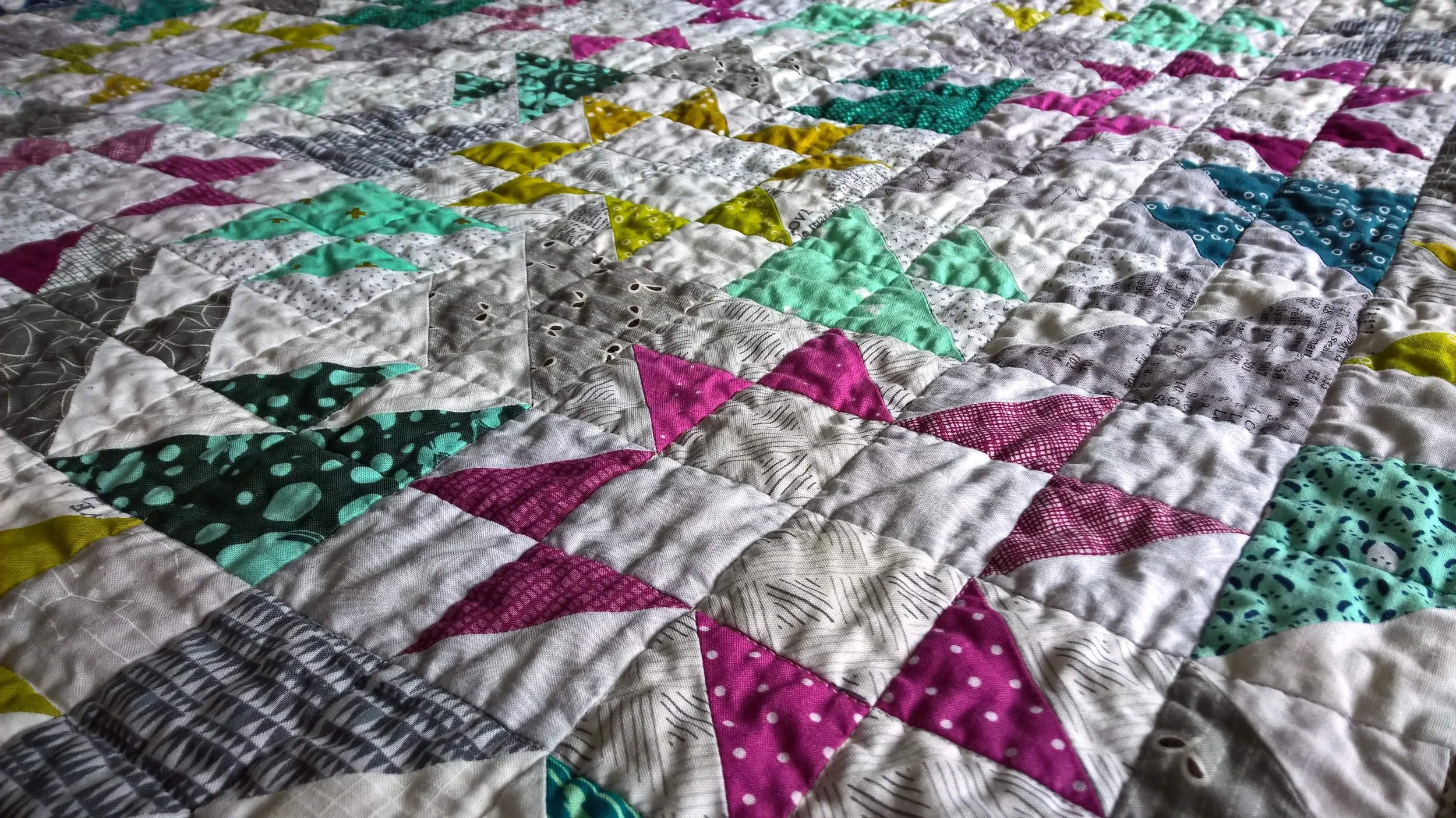 Up close and personal with the quilting! I stitched in the ditch in a 2-inch grid. The texture and drape is divine!