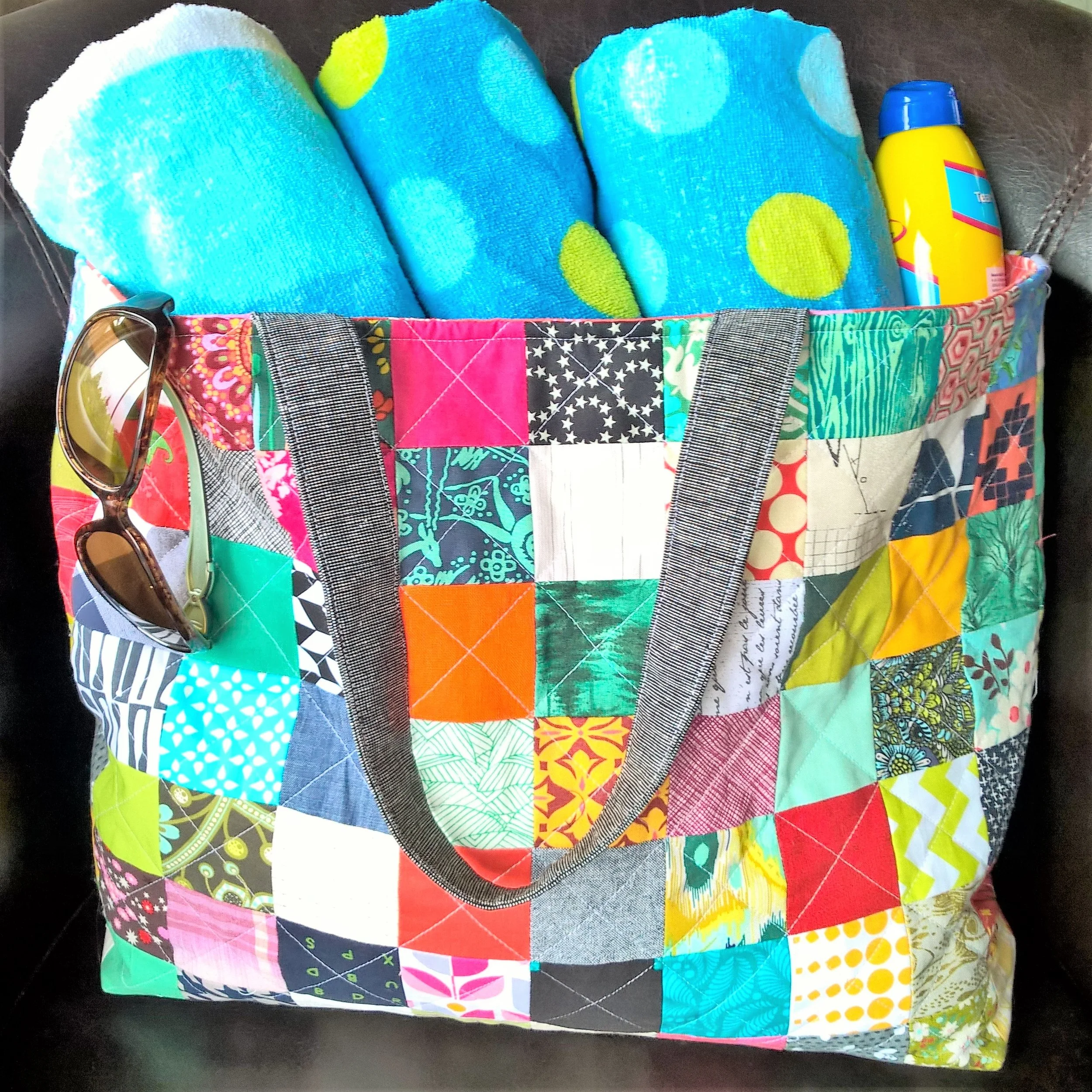 Quilted Patchwork Tote Bag Tutorial Follow this detailed tutorial to sew your own quilted patchwork tote using 2.5” squares, an ideal scrap-busting project!