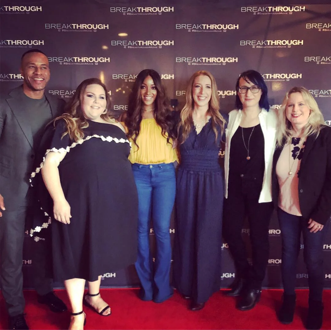 Producer DeVon Franklin and actress Chrissie Metz with the 3 writers of “Hold On”: Mickey Guyton (yellow shirt), Victoria, and Karen Kosowski (white jacket).