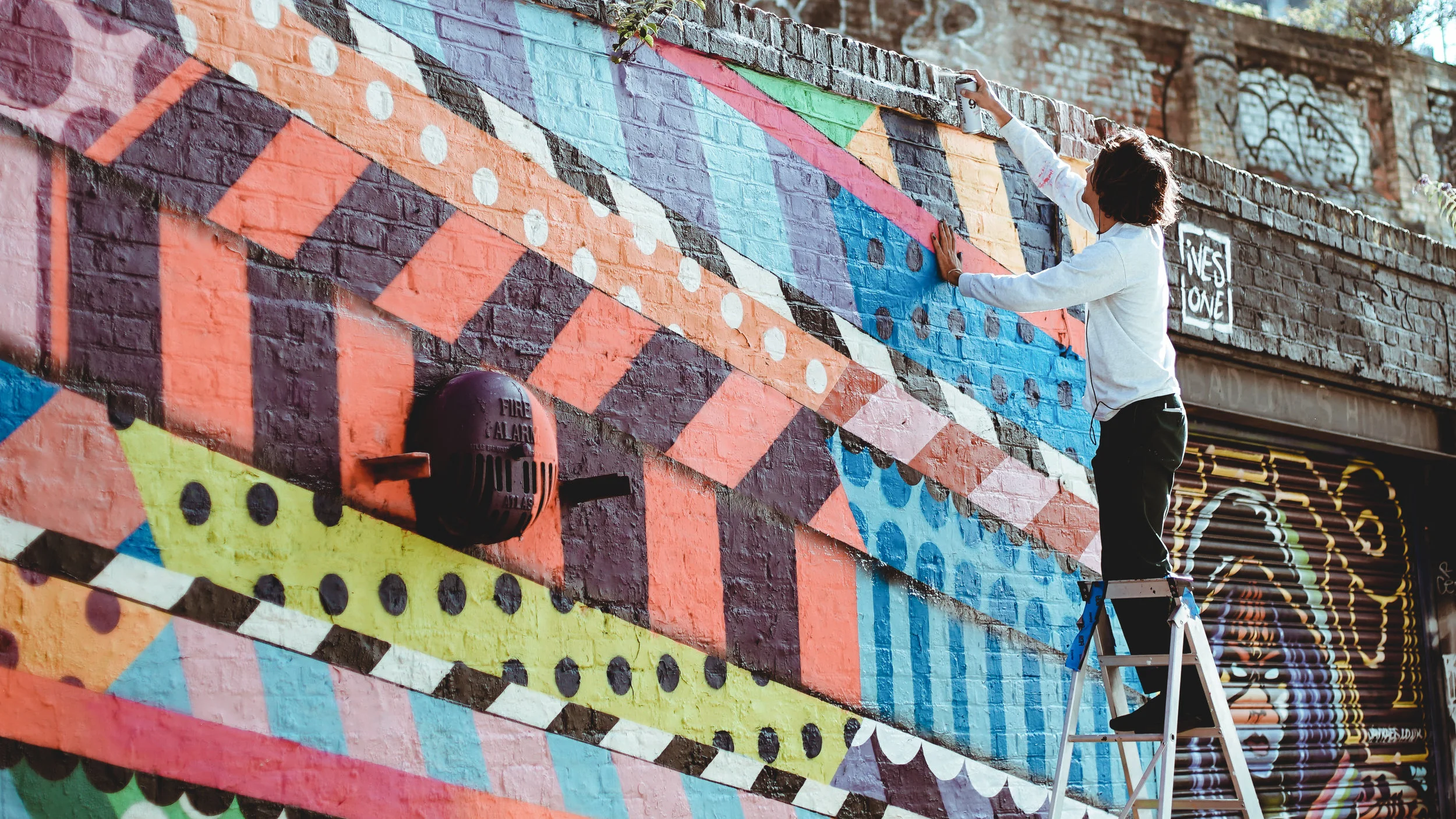 This picture is way cooler without the two people in high-vis holding the ladder still…