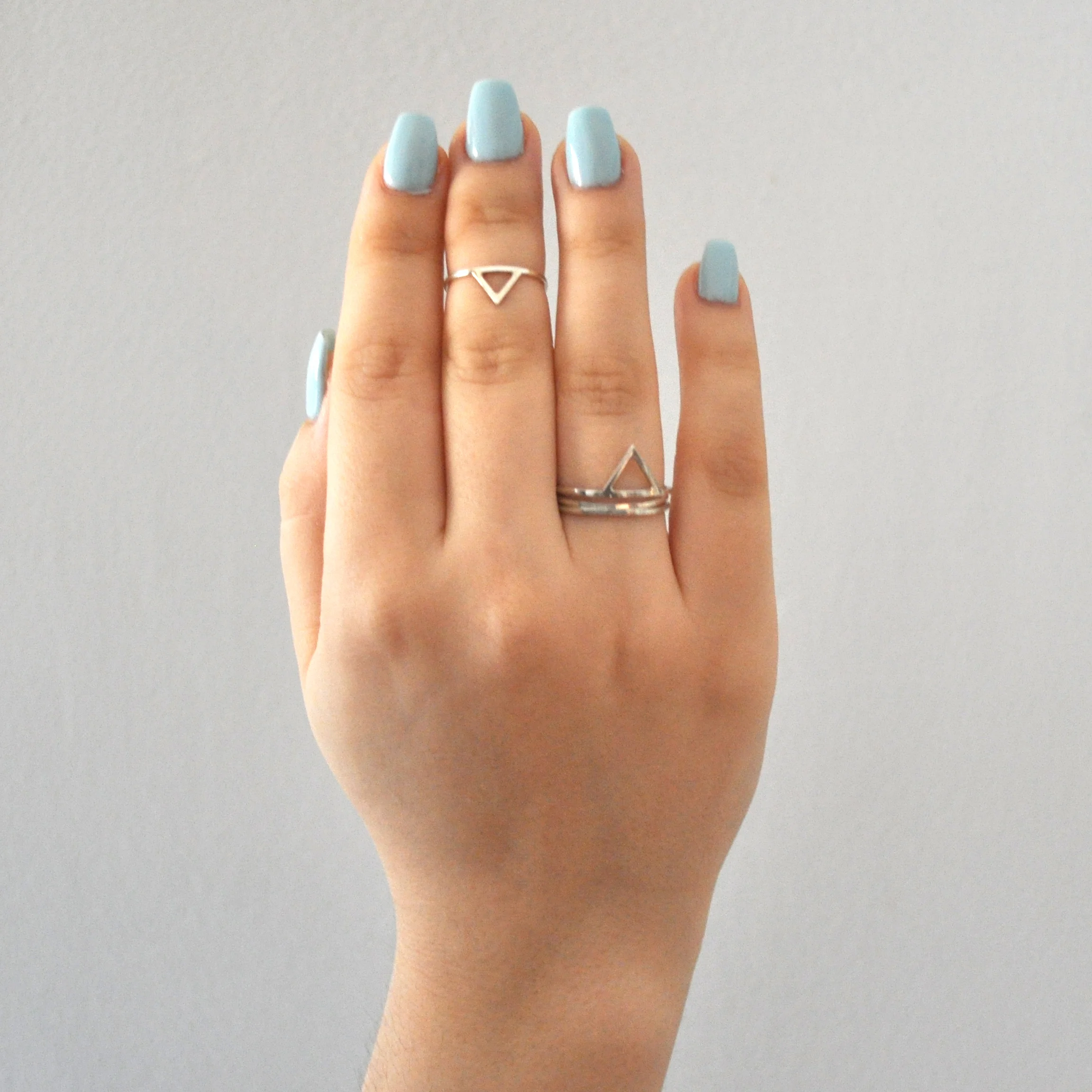 geometric-dainty-stacking-rings-hand.jpg