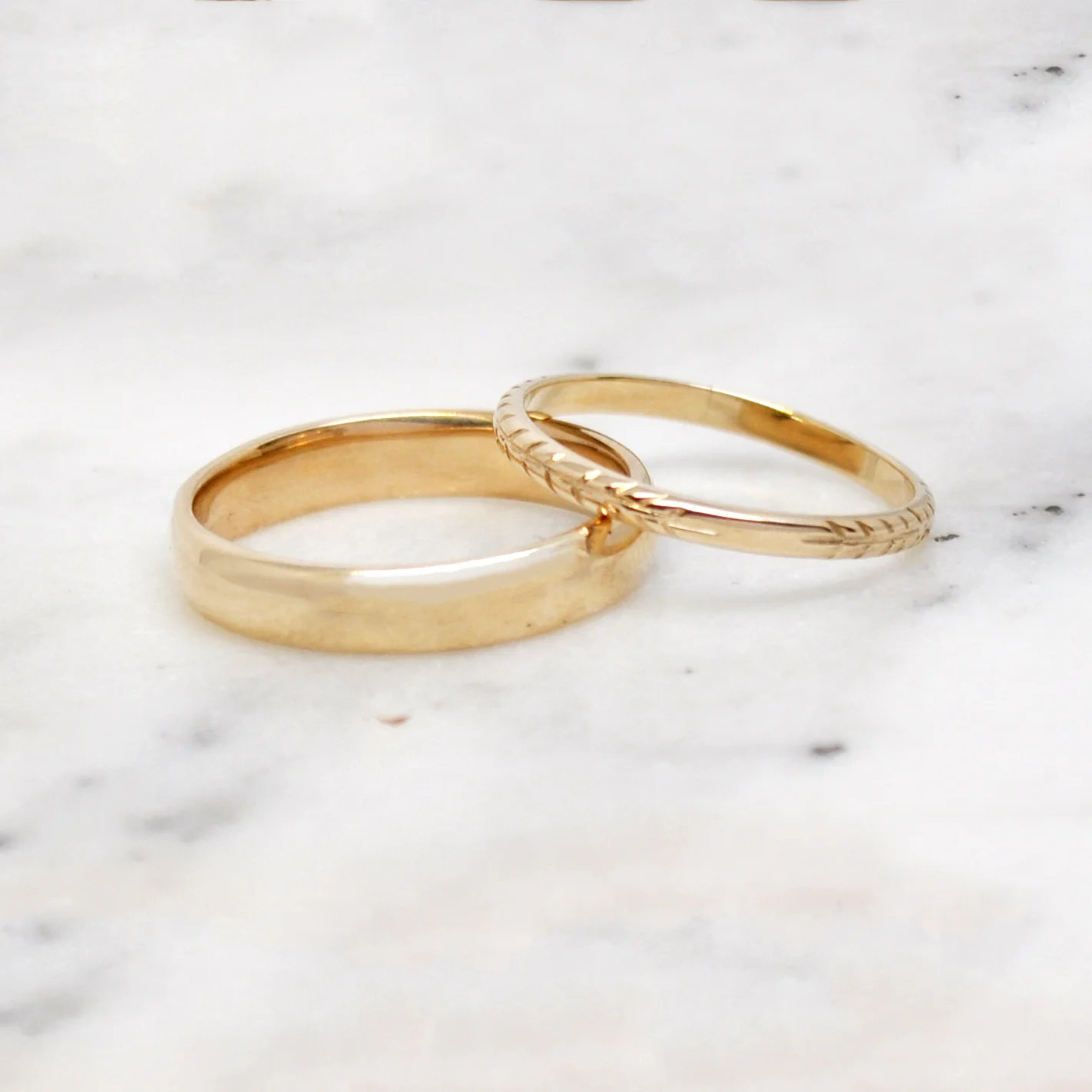 10k custom wedding bands with intricate hand engraving