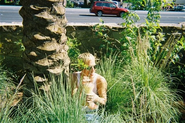 This was me on my 28th birthday, absolutely "not" pissed, sitting in a bush in las vegas drinking a strawberry daiquiri out of a plastic cowboy boot, which was about as close as I ever got to gardening! 