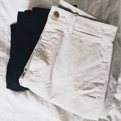 Women’s wide leg chino in washed black. Women’s wide leg crop pant in bone.