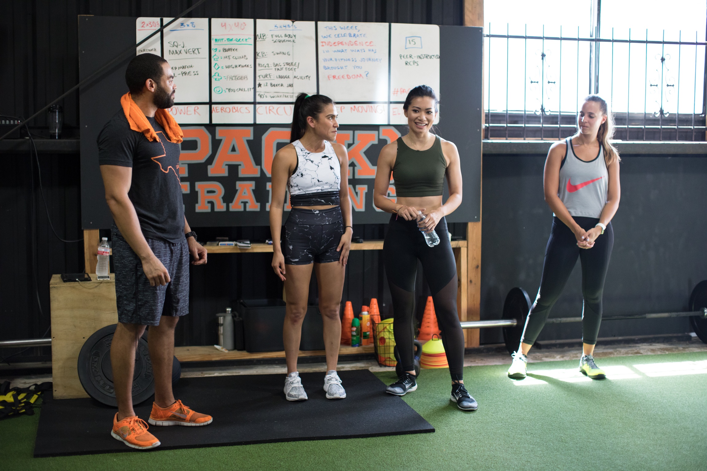  Starla and I introducing Terry, owner of The League, and Marlee, before they kick our butts with a PAC(K) Training class, which combines strength training and conditioning exercises! 