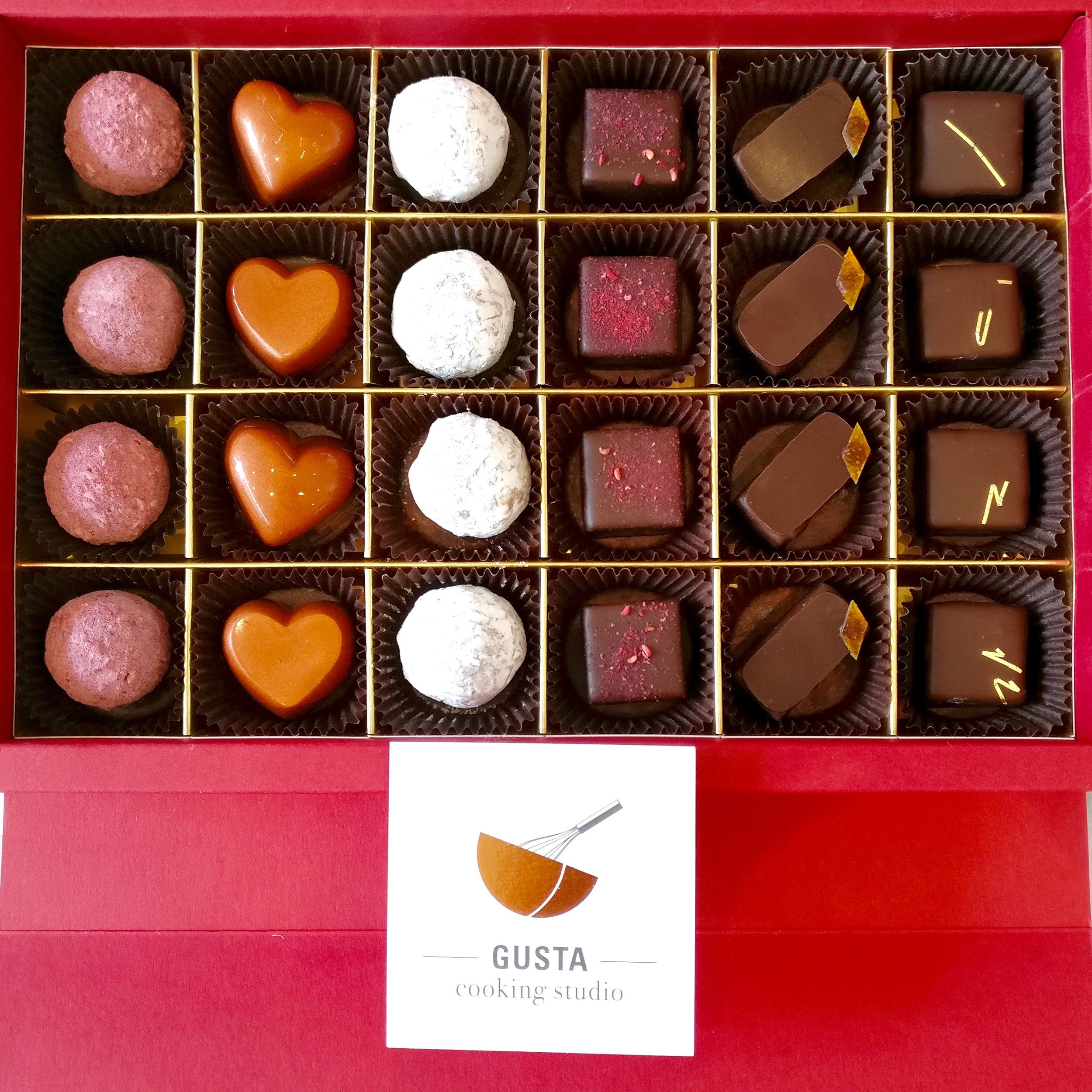 Valentine themed chocolate bonbons made by Gusta Cooking Studio
