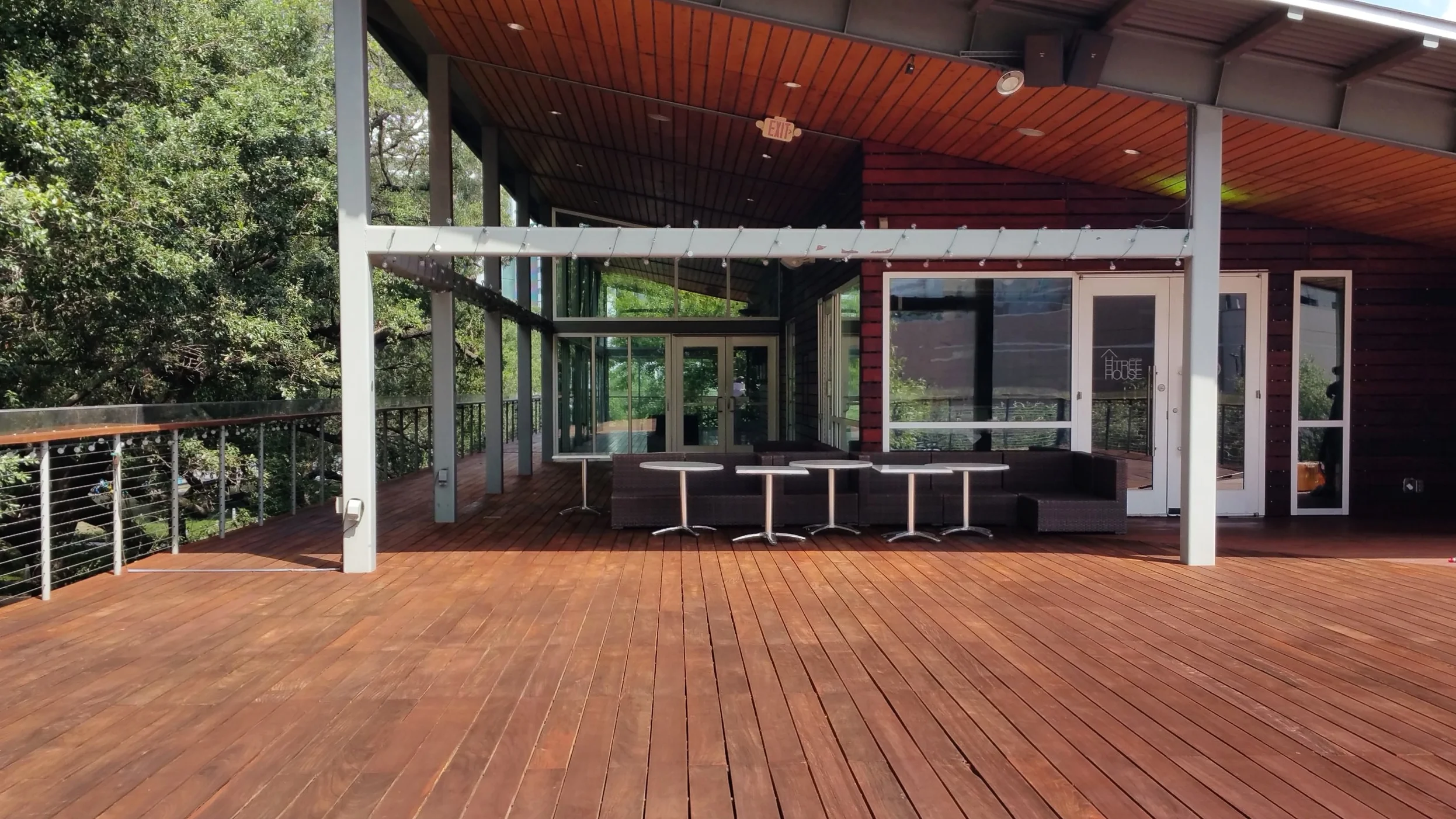 (AFTER) The final look of the deck after the completion of staining/sealing process.