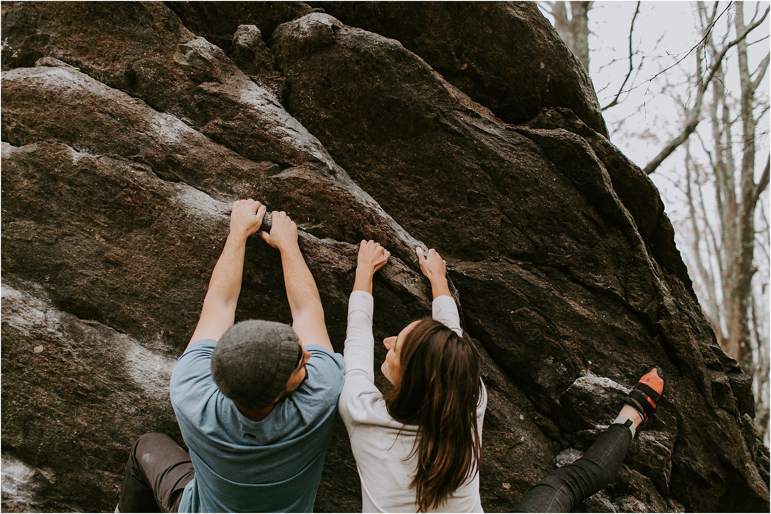  A couple goes rock climbing during their engagement session.  