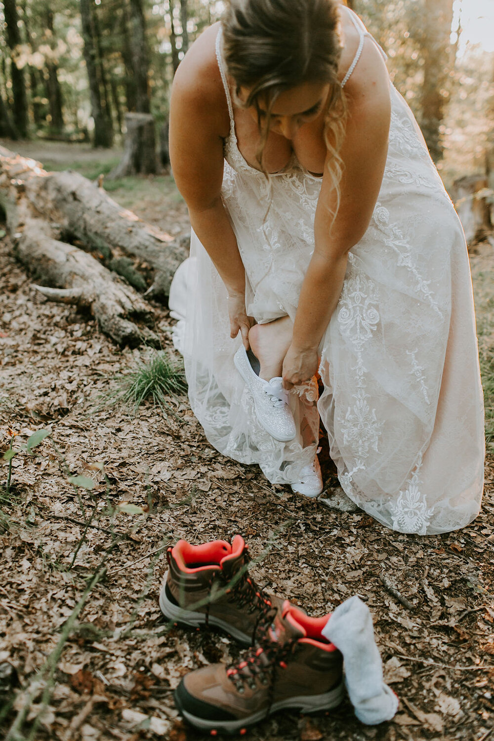 Bride putting on her shoes. 