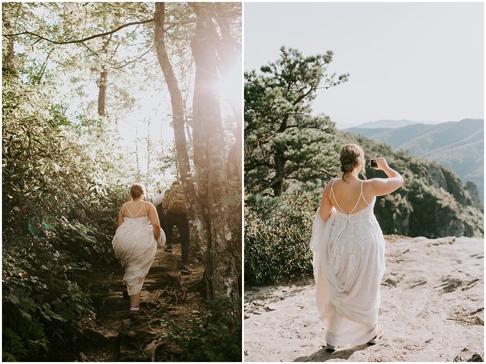 Bride walking through the woods and takes a picture with her phone of the views.