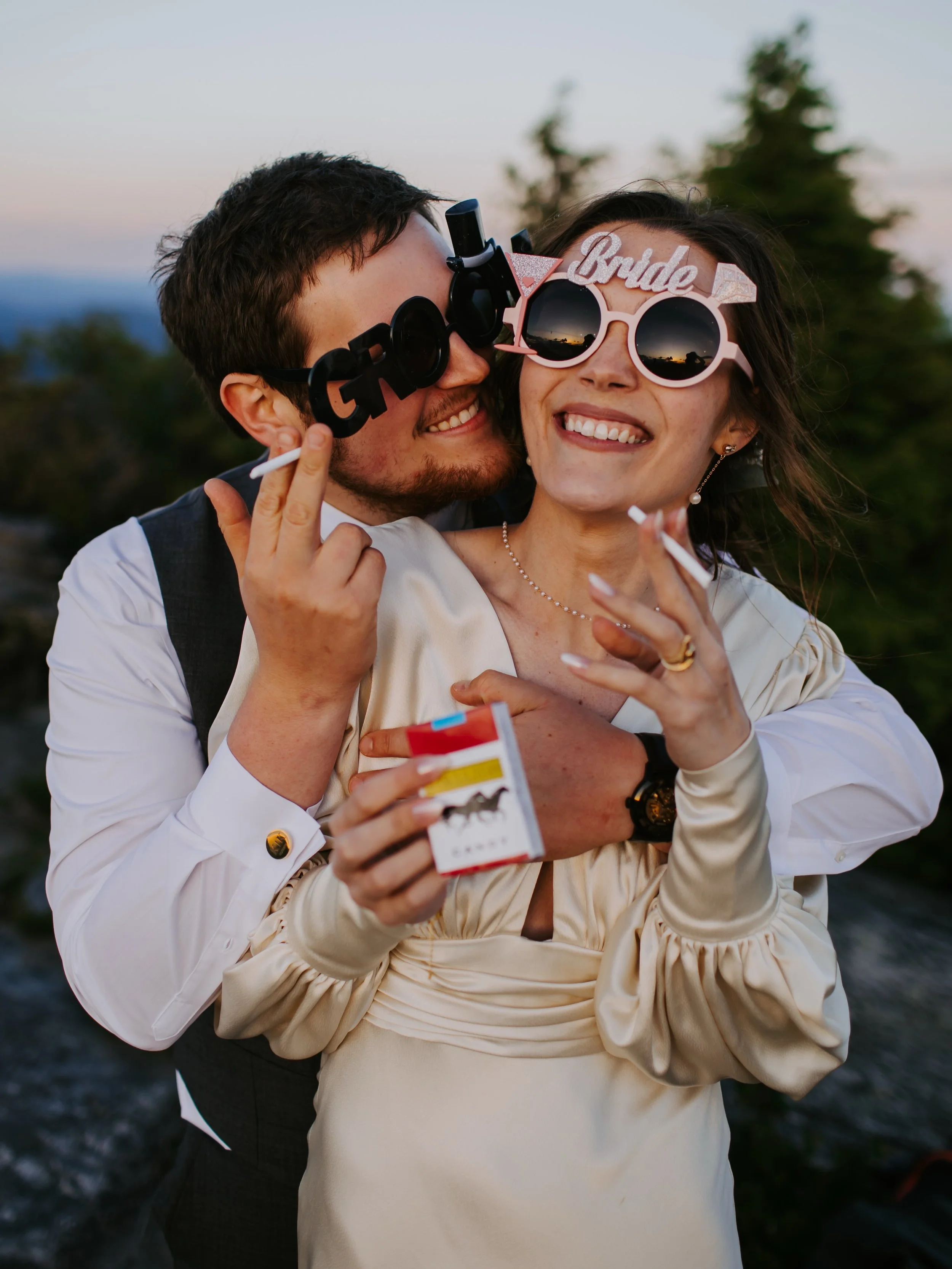 To add to your wedding day packing list: 

Favorite candy. 

On the hike down from their elopement we went through an impressive amount of twizzlers and no regrets were had. So pack some candy like silt fake cigarettes and ridiculous bride and groom 