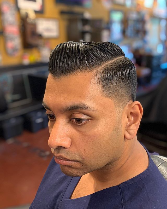 Some part action styled up with @theholyblack Pomade!! Get those appointments booked for the holidays!! @truenorthbarbershop
