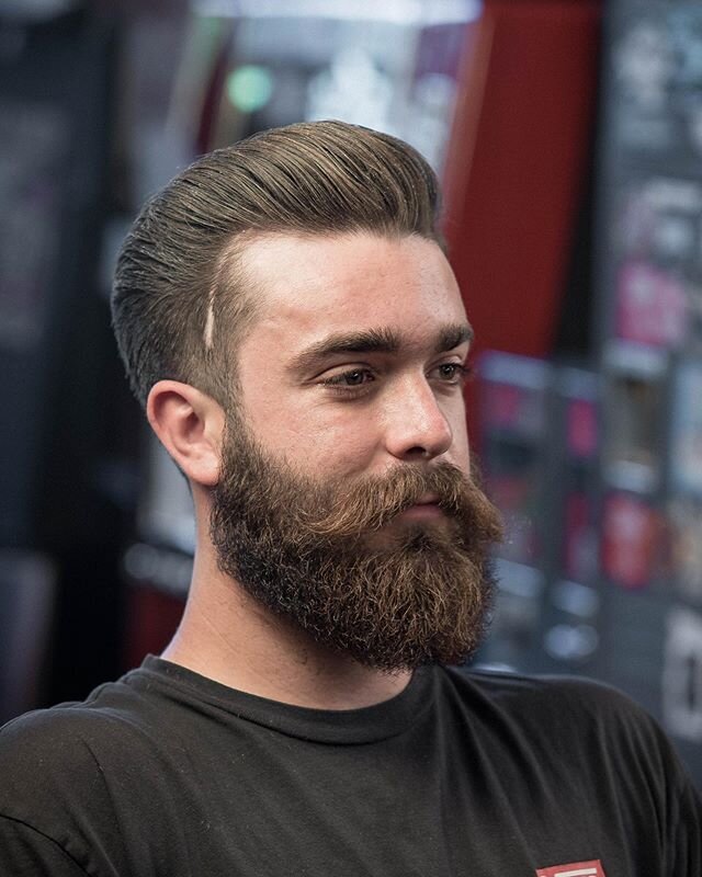 Executive contour and beard trim on @jasper_grant_lanning . To get the mustache to have more distinction from the rest of the beard I trim underneath the mustache area in order to give it more separation. 
#azbarber #theholyblack #barbershopconnect #