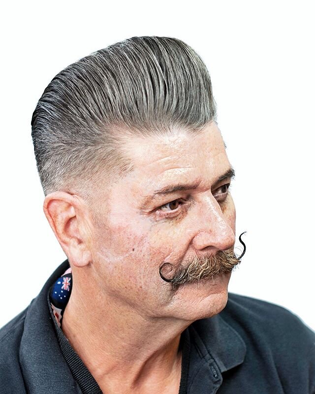 This an older picture of a pompadour I did on my friend Joe. It was on a crop sensor camera with a 50mm lens. I was still getting familiar with my camera and didn&rsquo;t always know what I was doing. 
#azbarber #theholyblack #barbershopconnect #ariz