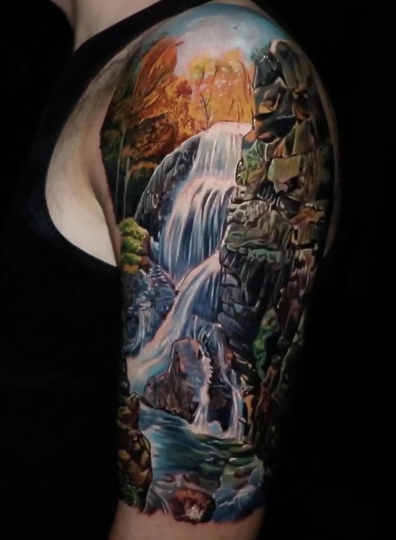 illustrated waterfall color tattoo by Chris Good at West Loop Tattoo Collective
