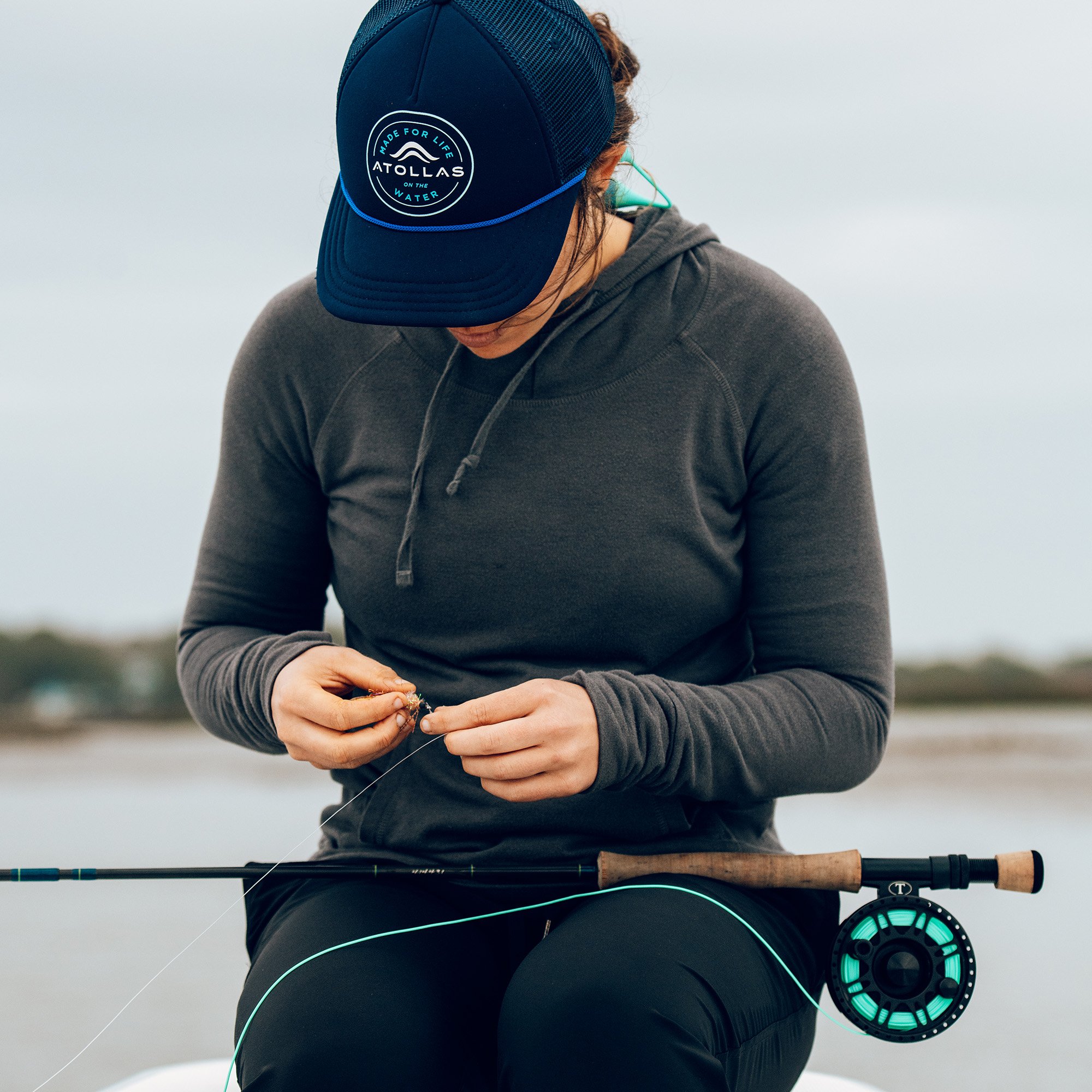 Atollas_LOTW snapback_blue_tying fly.jpg