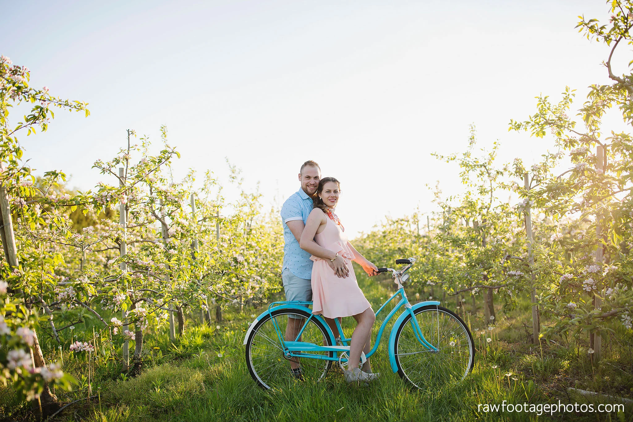 london_ontario_wedding_photographer-raw_footage_photography-engagement_session-airport_session-airplane-balloons-apple_orchard-spring_blooms-apple_blossoms024.jpg