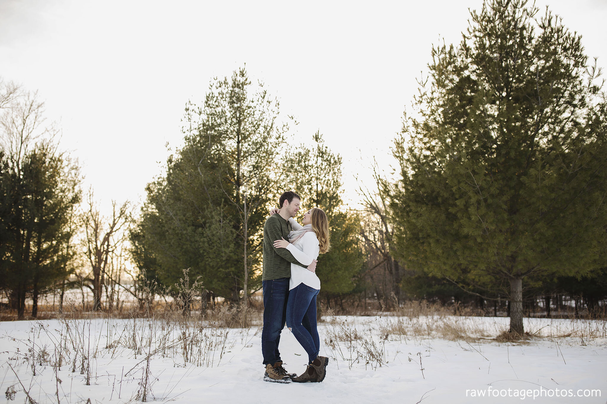 london_ontario_wedding_photographer-engagement_session-winter_e_session-snowy_couple_session-golden_hour_photos-cozy_winter_session-raw_footage_photography-dog016.jpg