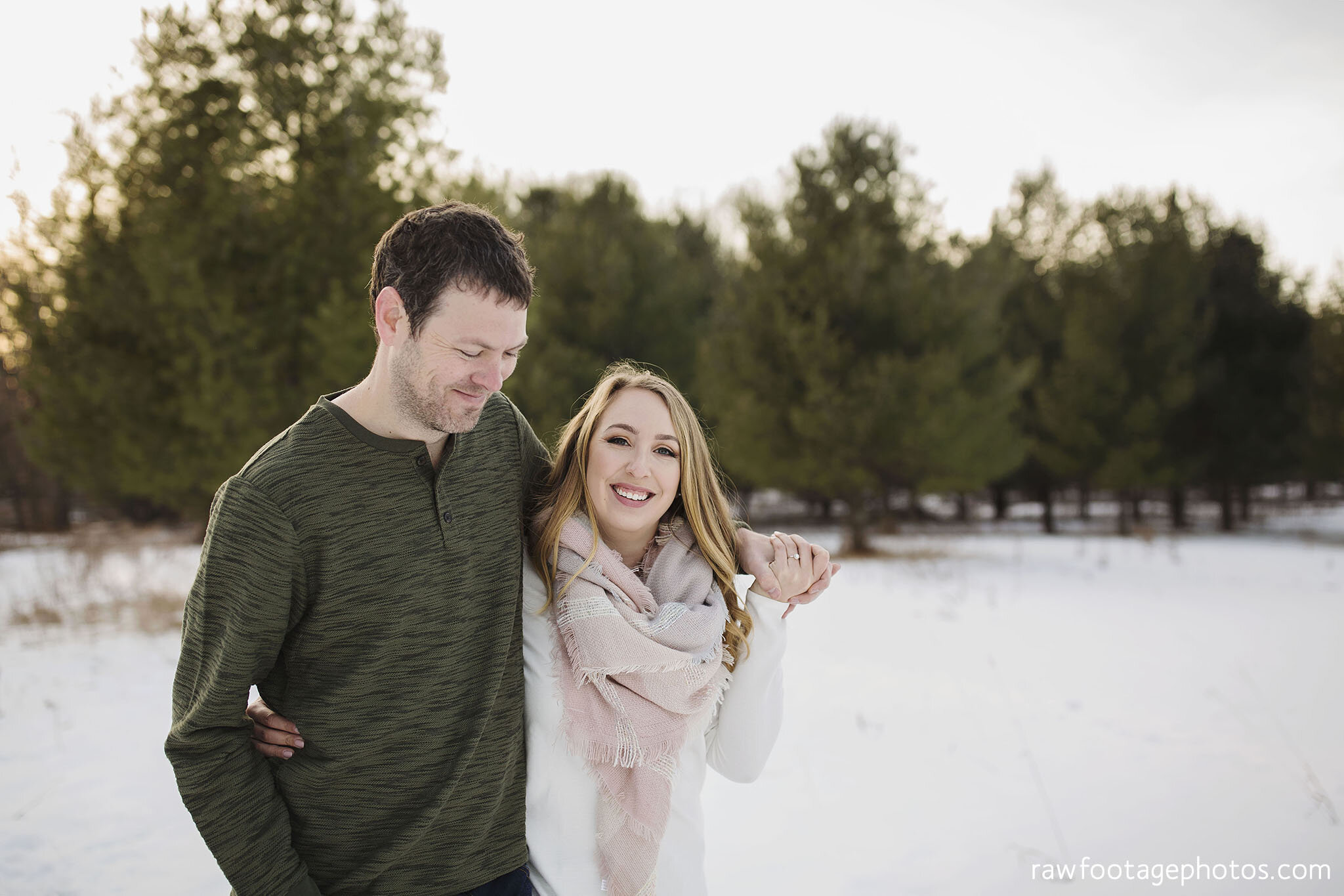 london_ontario_wedding_photographer-engagement_session-winter_e_session-snowy_couple_session-golden_hour_photos-cozy_winter_session-raw_footage_photography-dog019.jpg