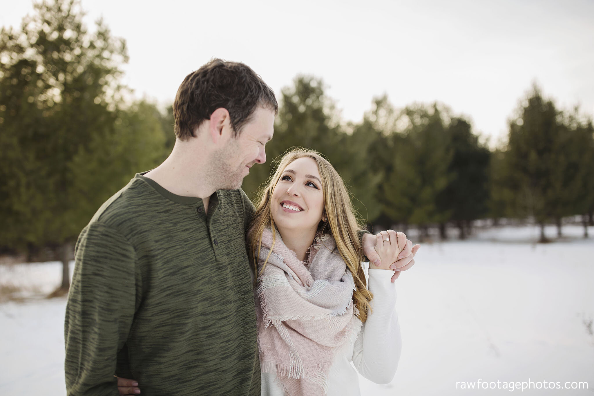 london_ontario_wedding_photographer-engagement_session-winter_e_session-snowy_couple_session-golden_hour_photos-cozy_winter_session-raw_footage_photography-dog020.jpg