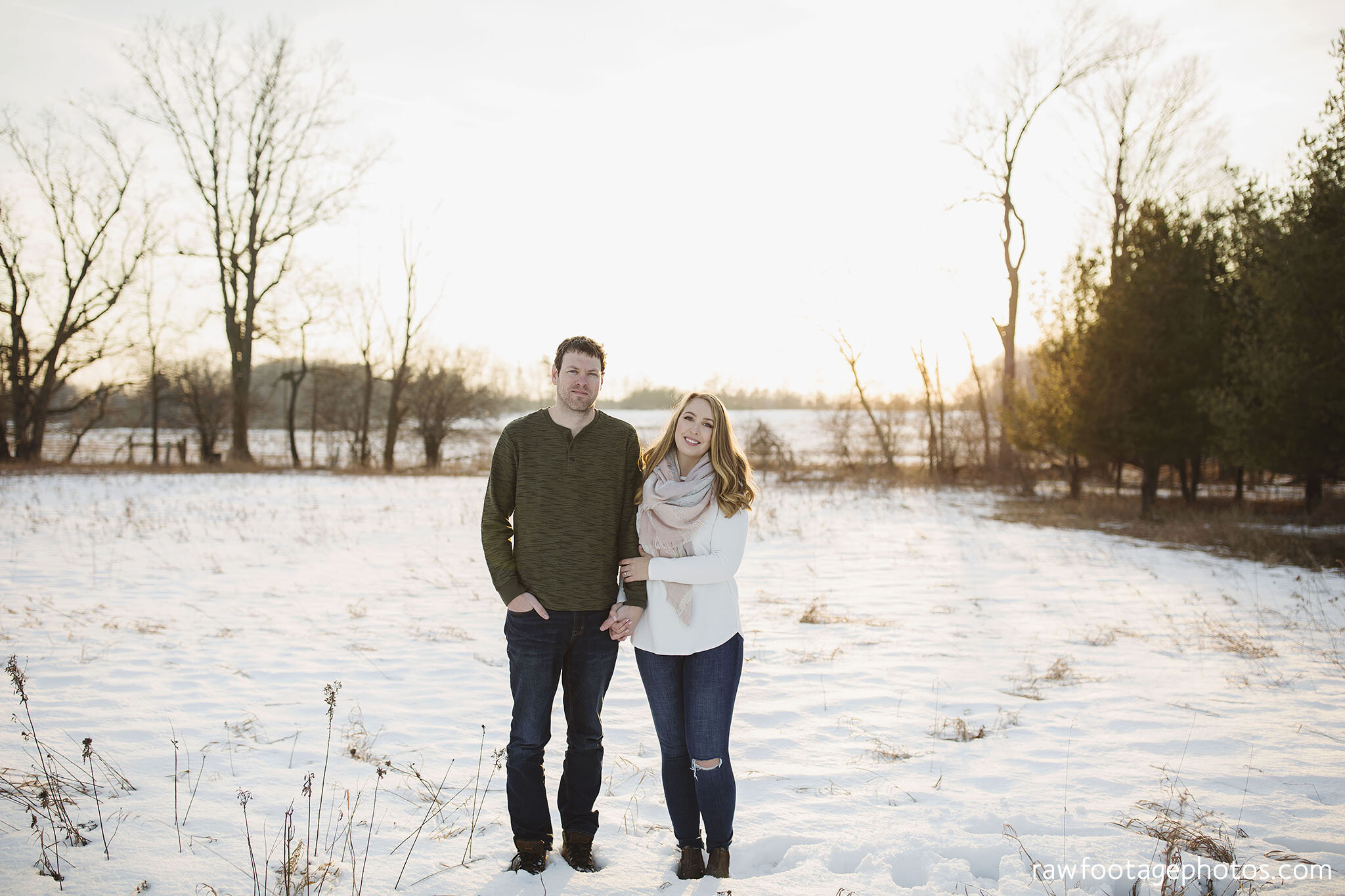 london_ontario_wedding_photographer-engagement_session-winter_e_session-snowy_couple_session-golden_hour_photos-cozy_winter_session-raw_footage_photography-dog021.jpg