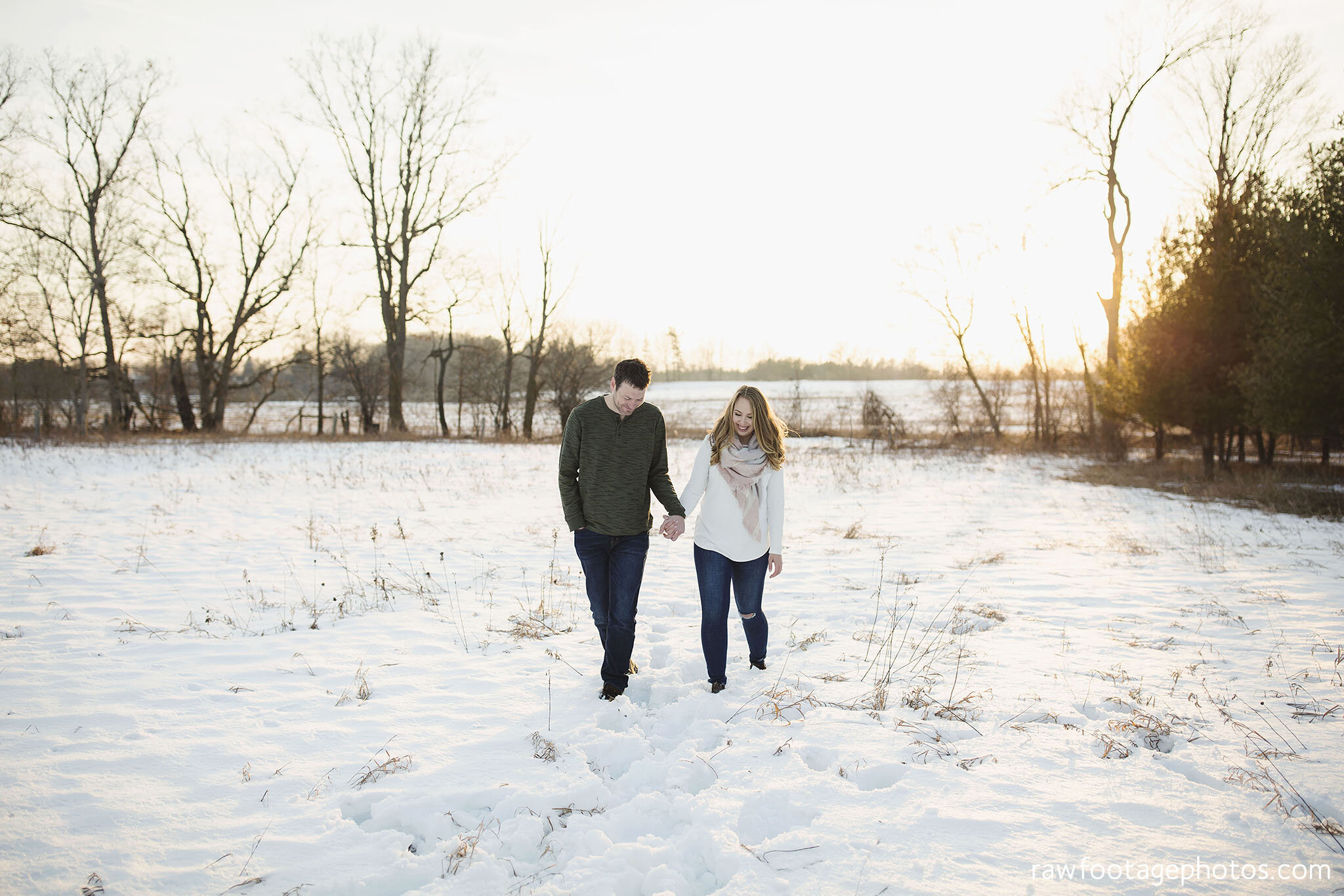 london_ontario_wedding_photographer-engagement_session-winter_e_session-snowy_couple_session-golden_hour_photos-cozy_winter_session-raw_footage_photography-dog022.jpg