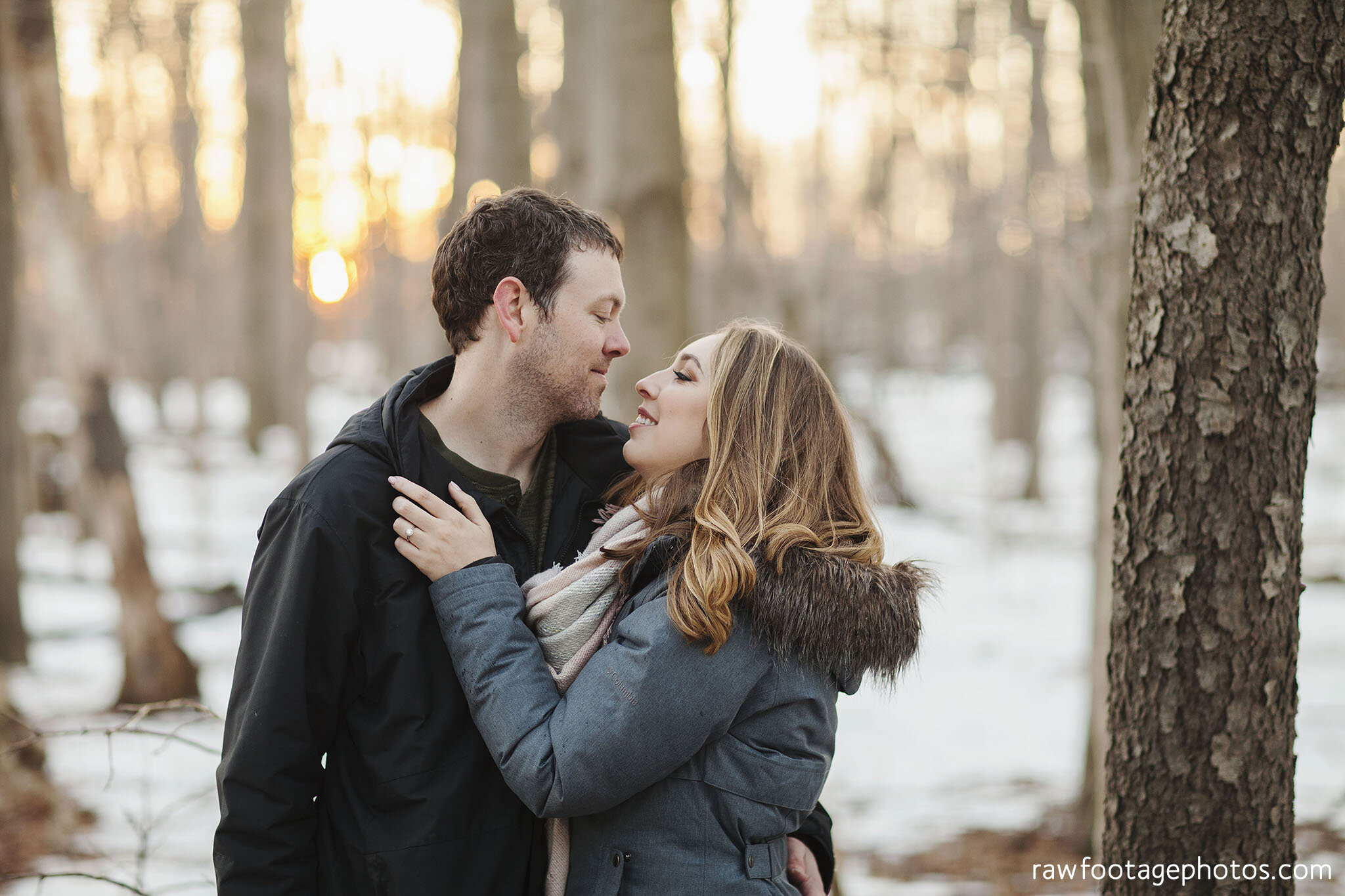 london_ontario_wedding_photographer-engagement_session-winter_e_session-snowy_couple_session-golden_hour_photos-cozy_winter_session-raw_footage_photography-dog031.jpg