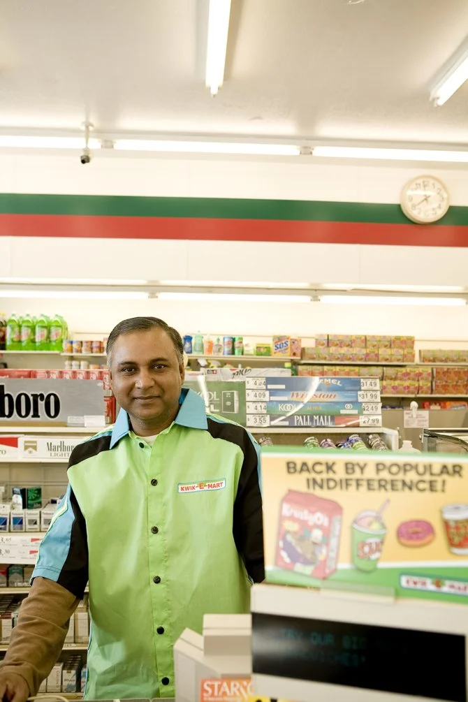 kwik-e-mart-clerk-7-eleven-simpsons.jpg