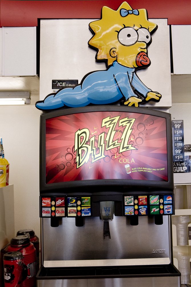 kwik-e-mart-buzz-cola-maggie-simpsons.jpg