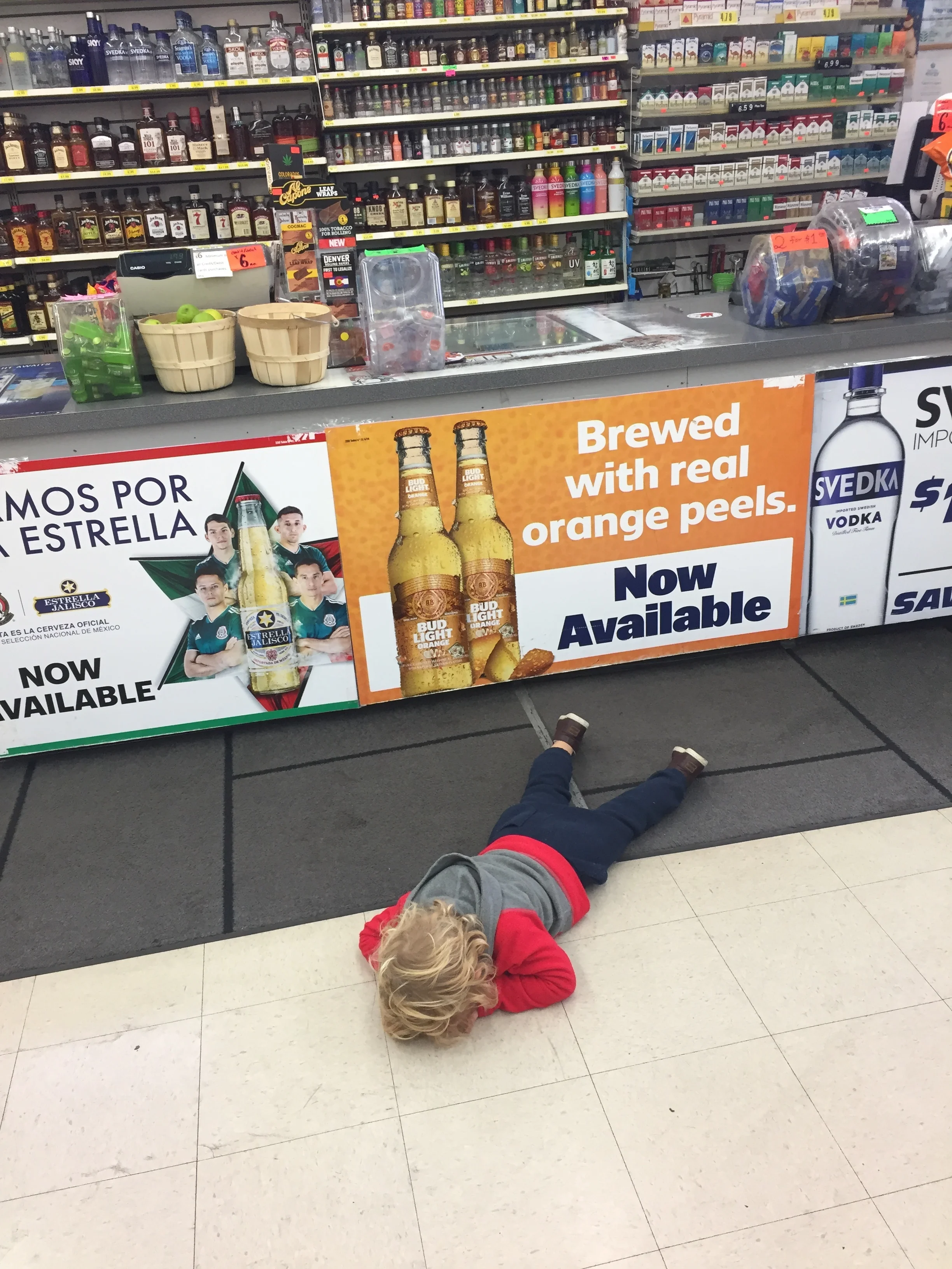 Mad because I wouldn’t let him knock down all of the liquor bottles. #suchahardass