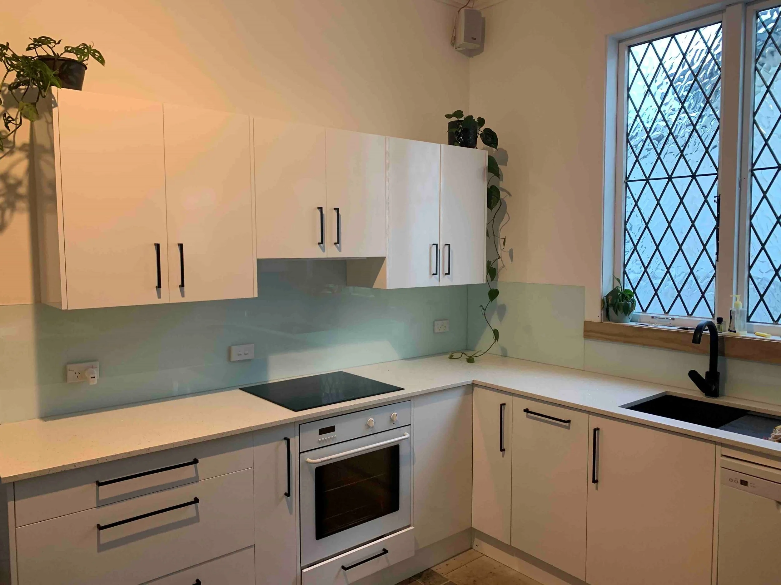 M Ellliott splashback.pdf.jpg